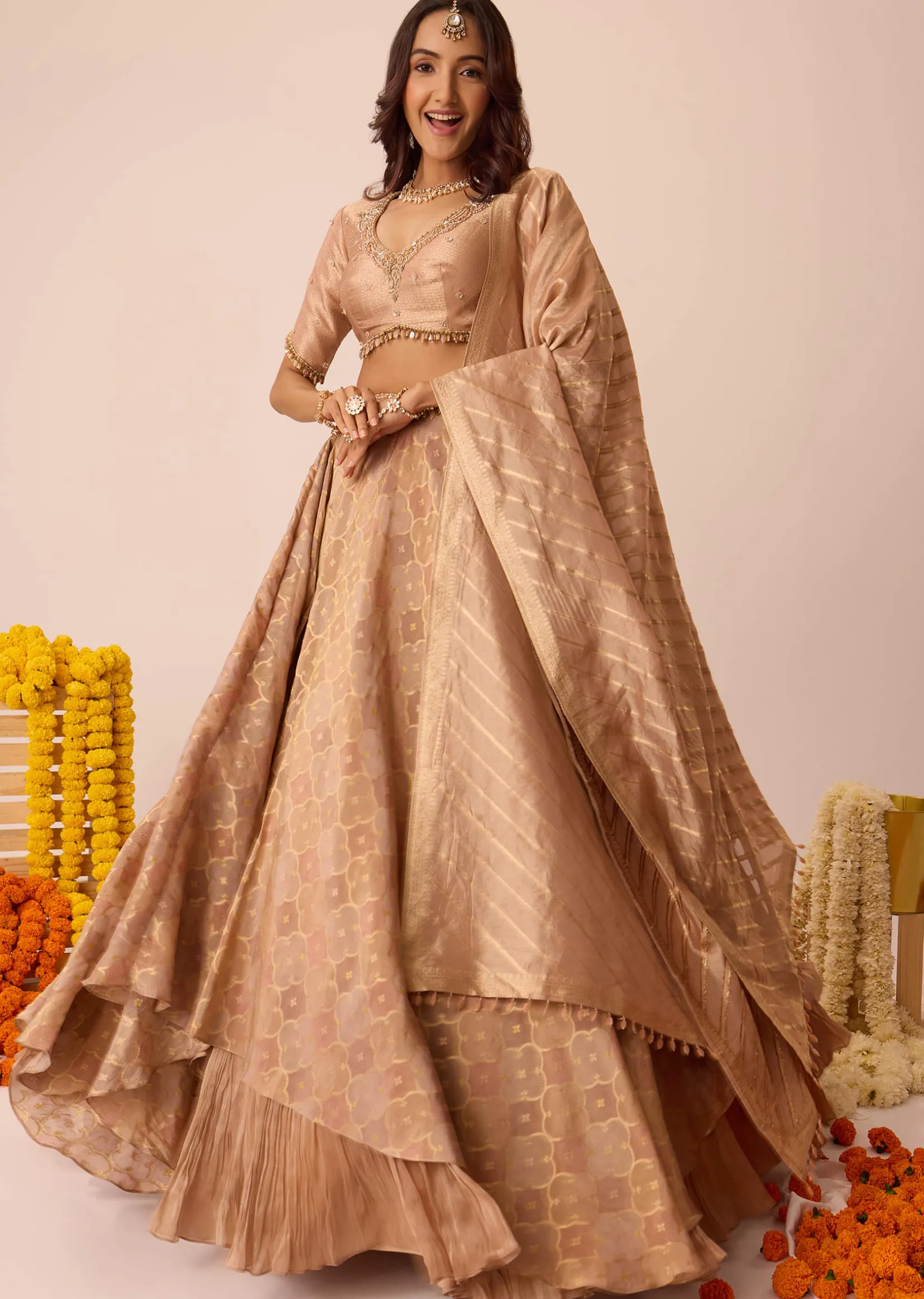 Peach Embroidered Blouse With Ruching Lehenga And Tassel Dupatta