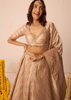Peach Embroidered Blouse With Ruching Lehenga And Tassel Dupatta