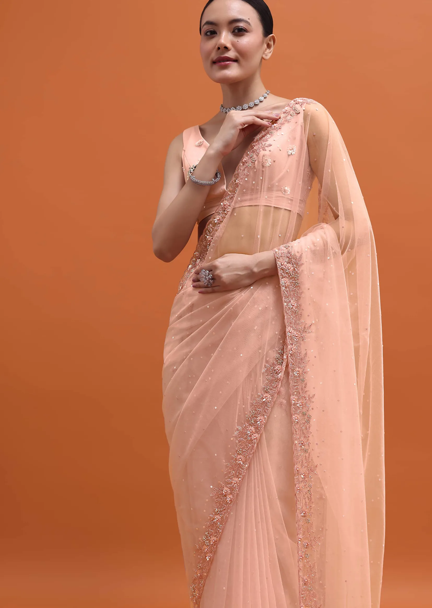 Peach Embroidered Net Saree With Unstitched Blouse