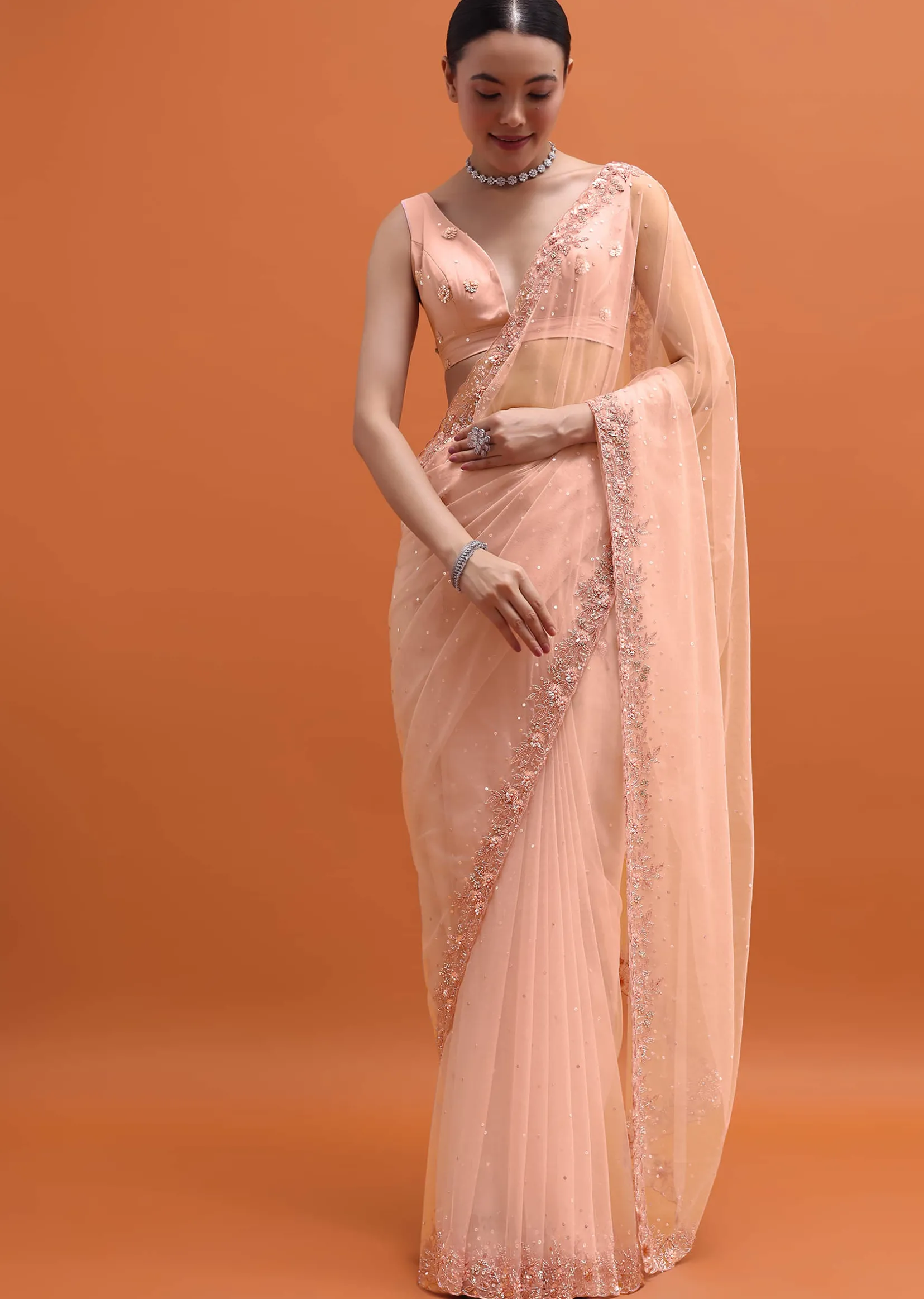 Peach Embroidered Net Saree With Unstitched Blouse