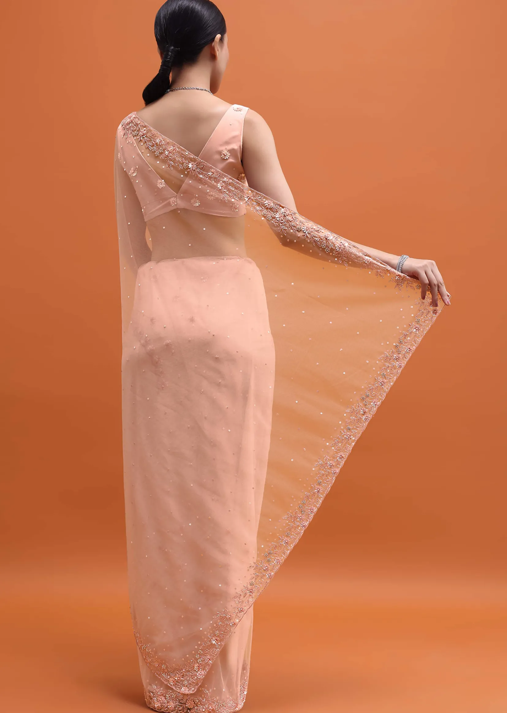 Peach Embroidered Net Saree With Unstitched Blouse