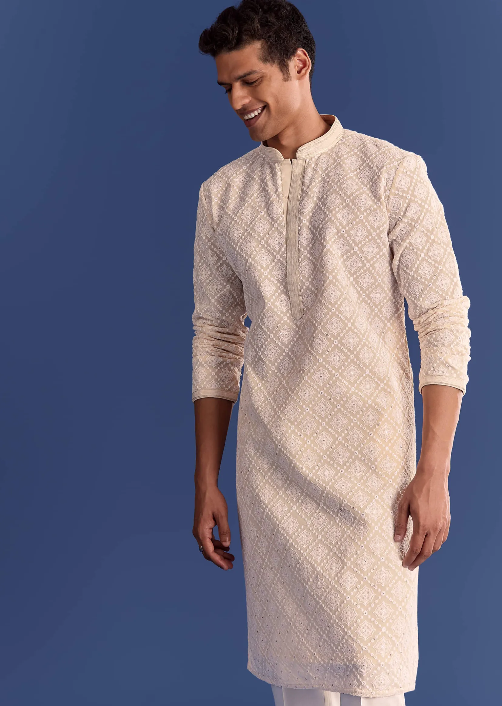 Peach Georgette Kurta Set With All Over Embroidery