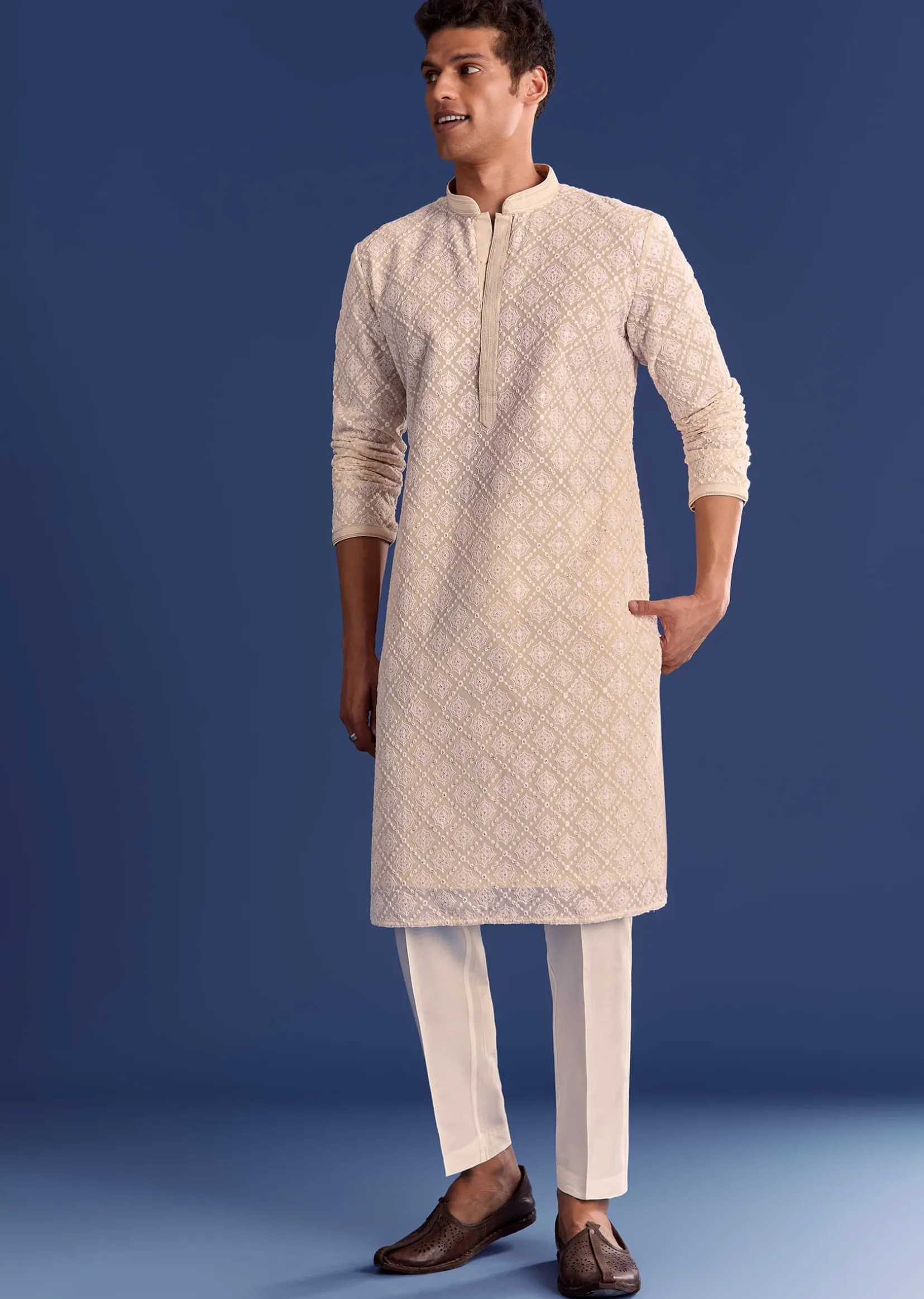 Peach Georgette Kurta Set With All Over Embroidery