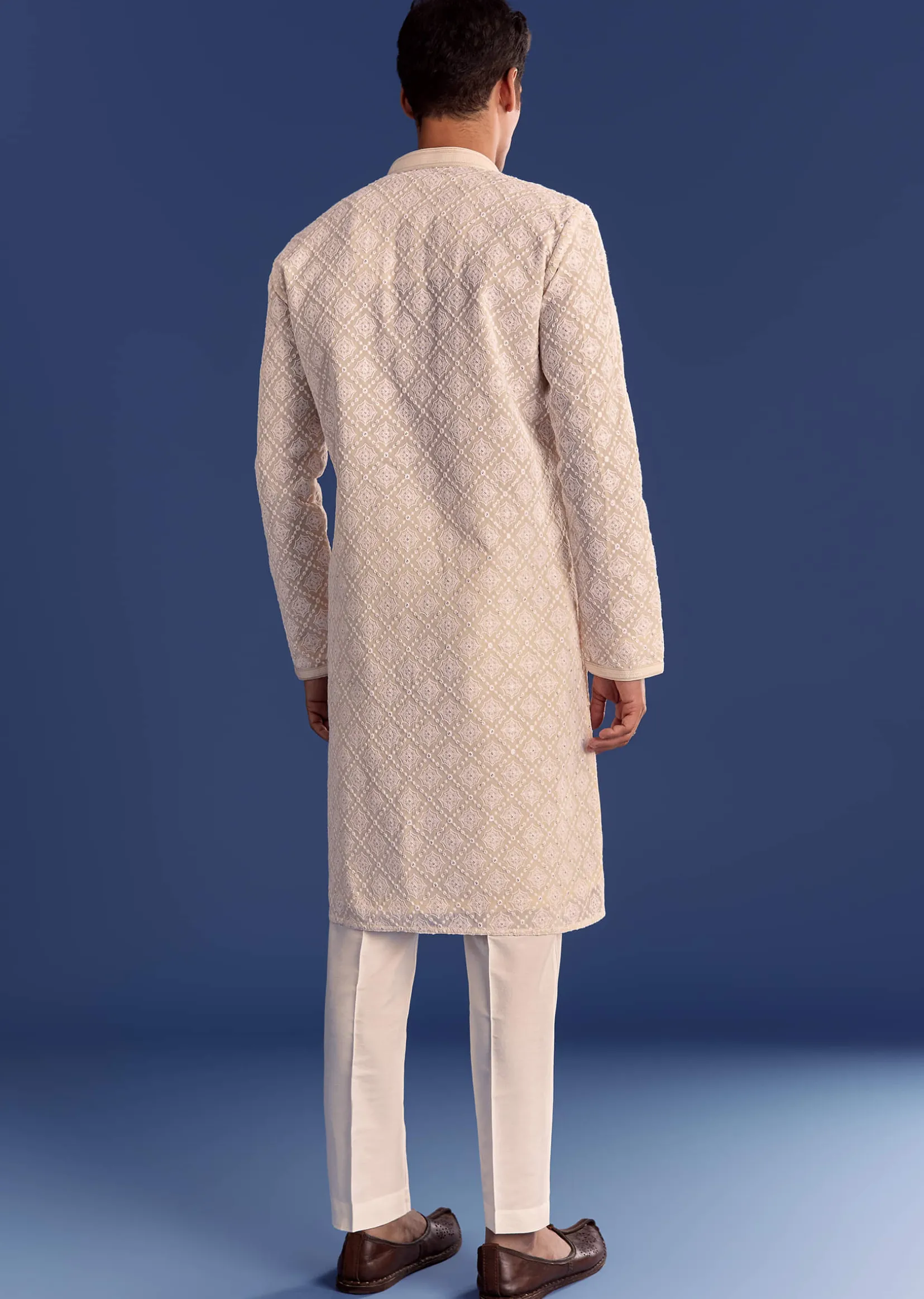 Peach Georgette Kurta Set With All Over Embroidery