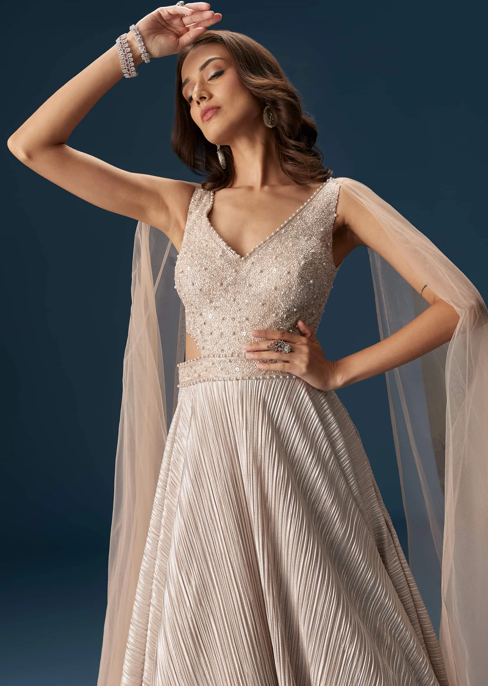 Peach Gown With Fully Embroidered Yoke And Feather Embellished Shoulders