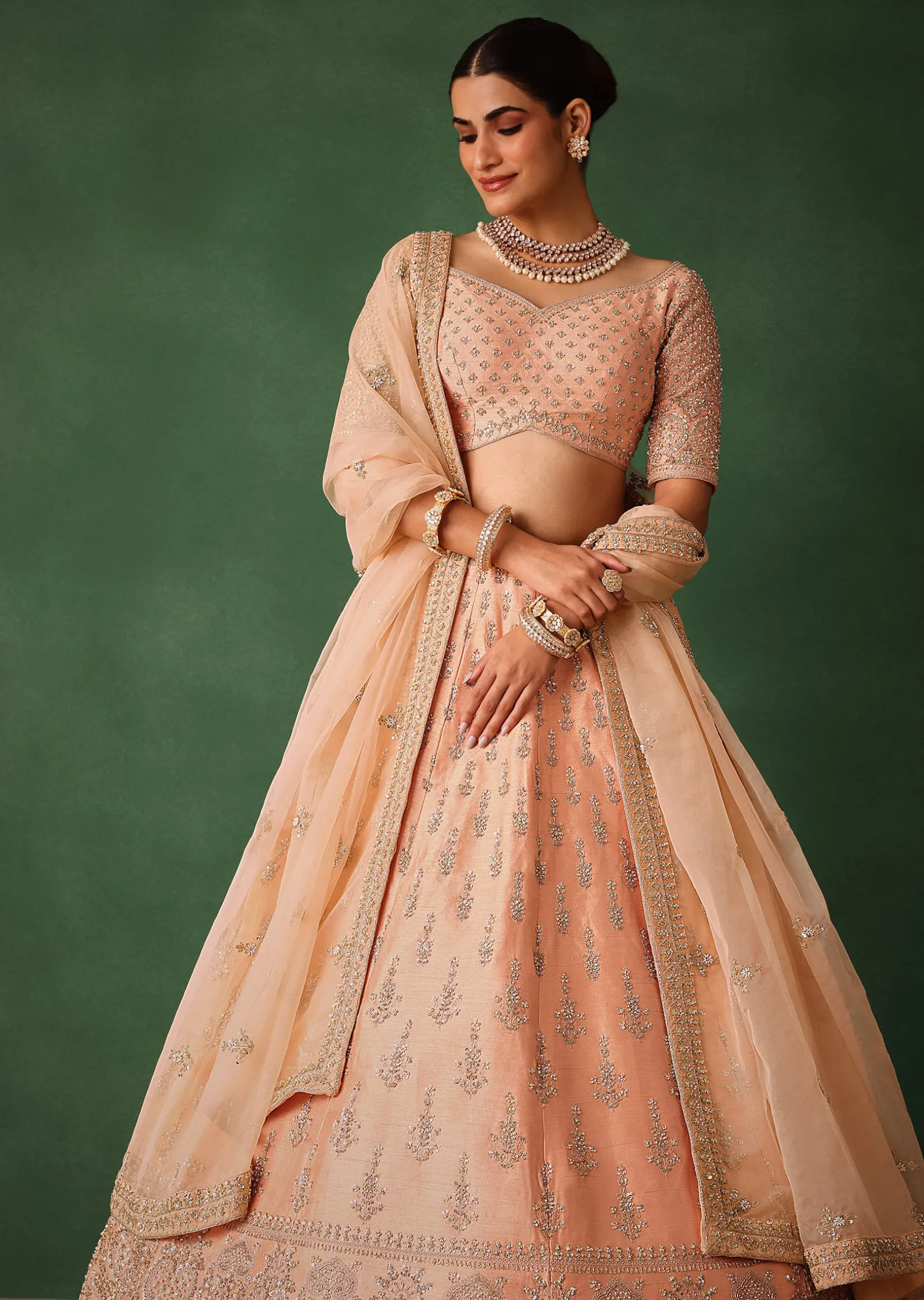 Peach Hand Embroidered Raw Silk Lehenga Set With Butti Work