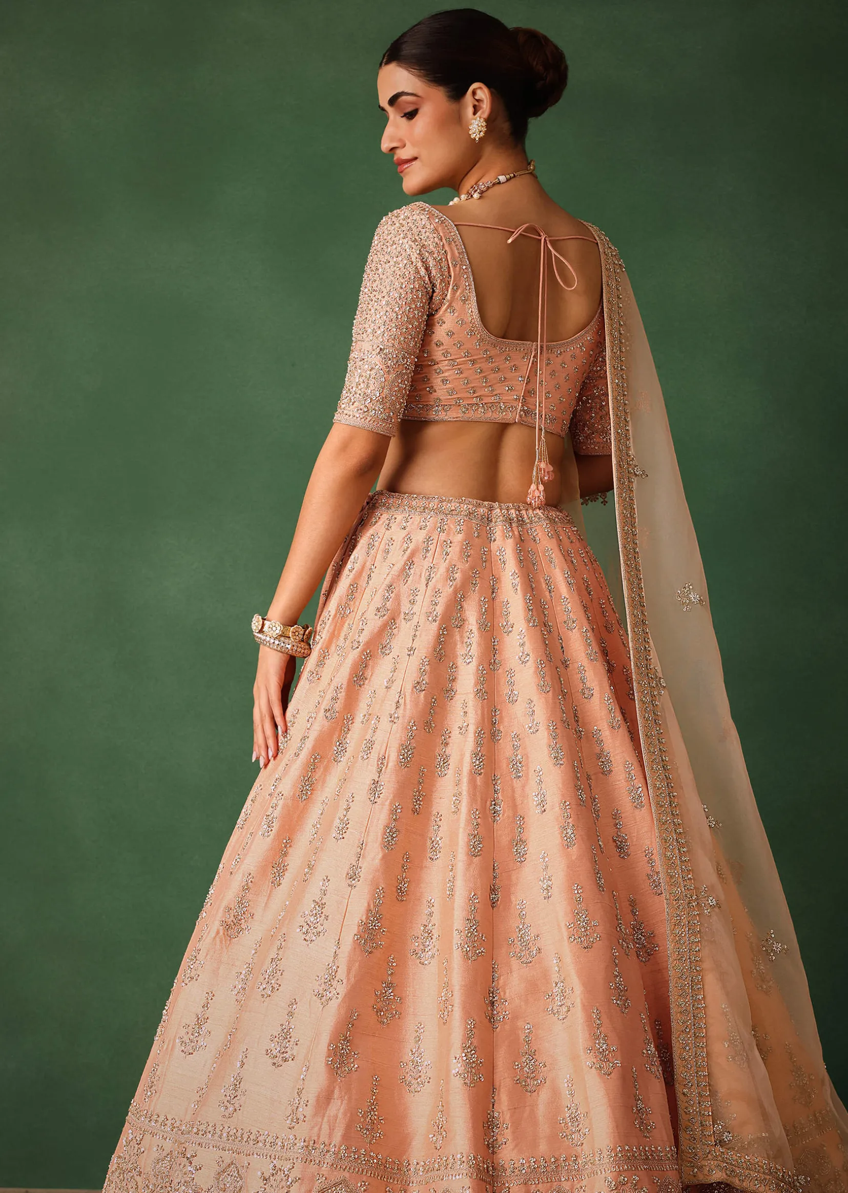 Peach Hand Embroidered Raw Silk Lehenga Set With Butti Work