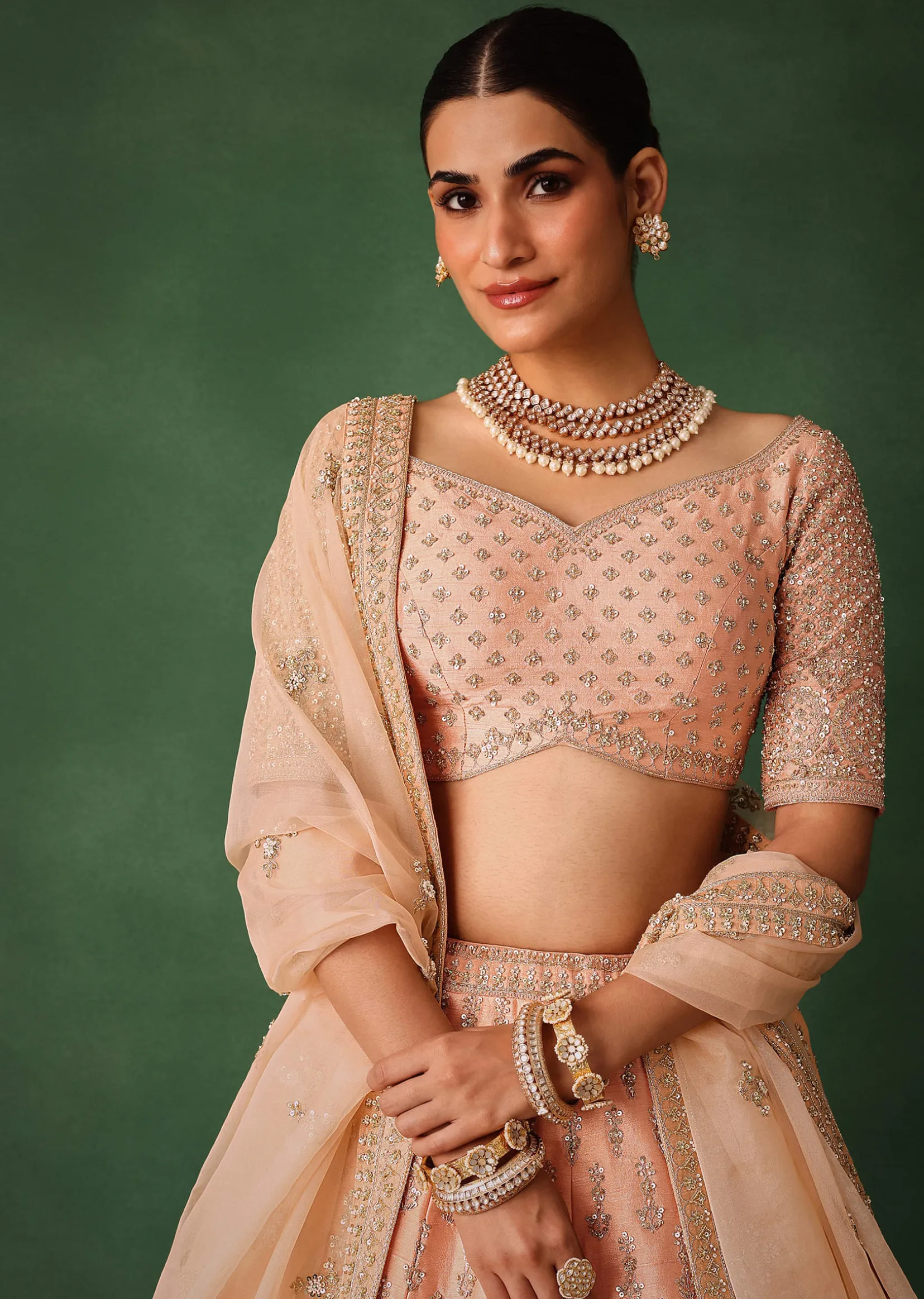 Peach Hand Embroidered Raw Silk Lehenga Set With Butti Work