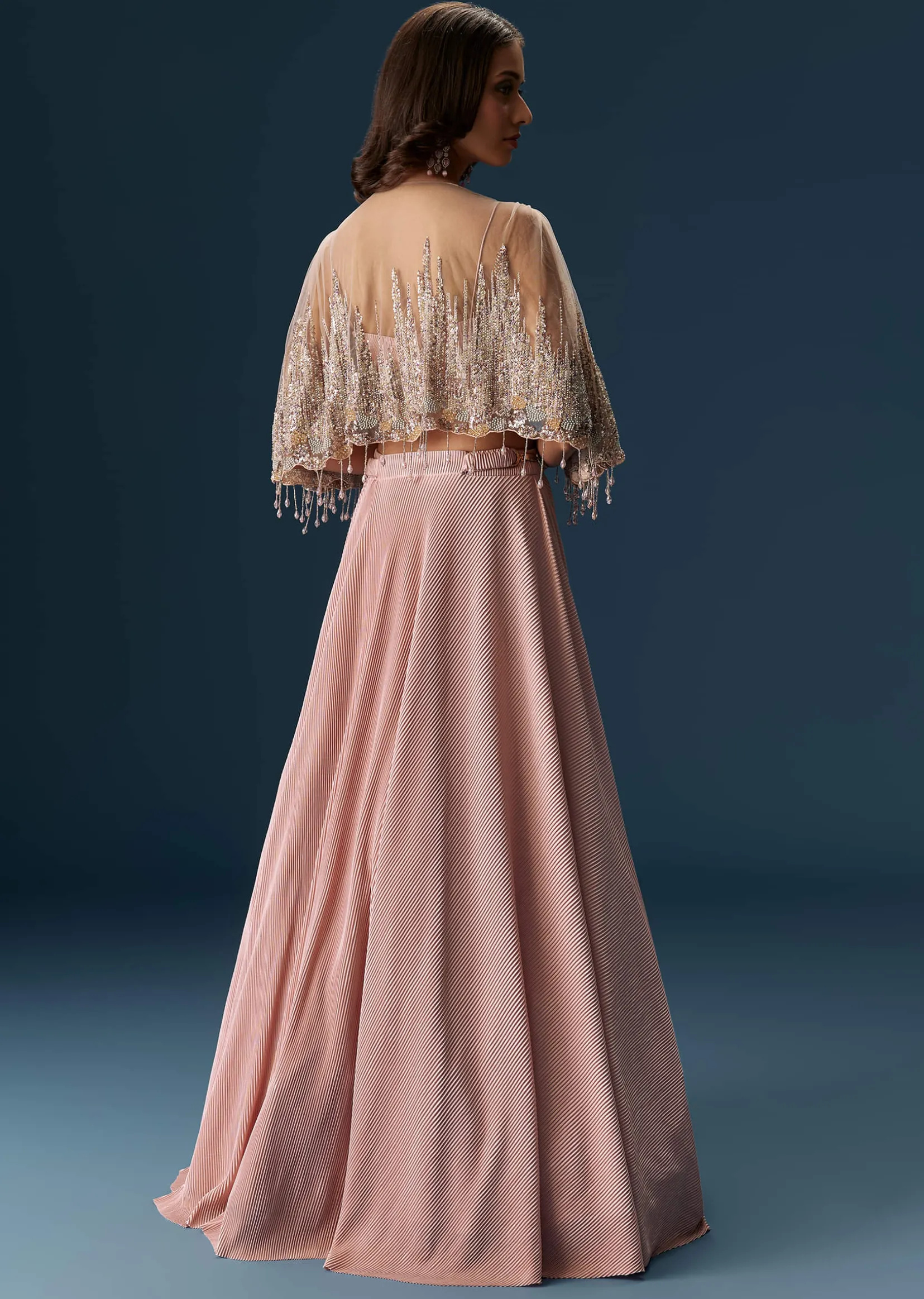 Peach Lehenga With Embroidered Blouse And Coordinating Cape
