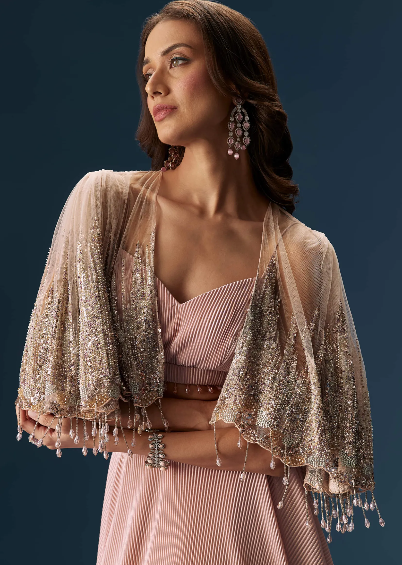 Peach Lehenga With Embroidered Blouse And Coordinating Cape