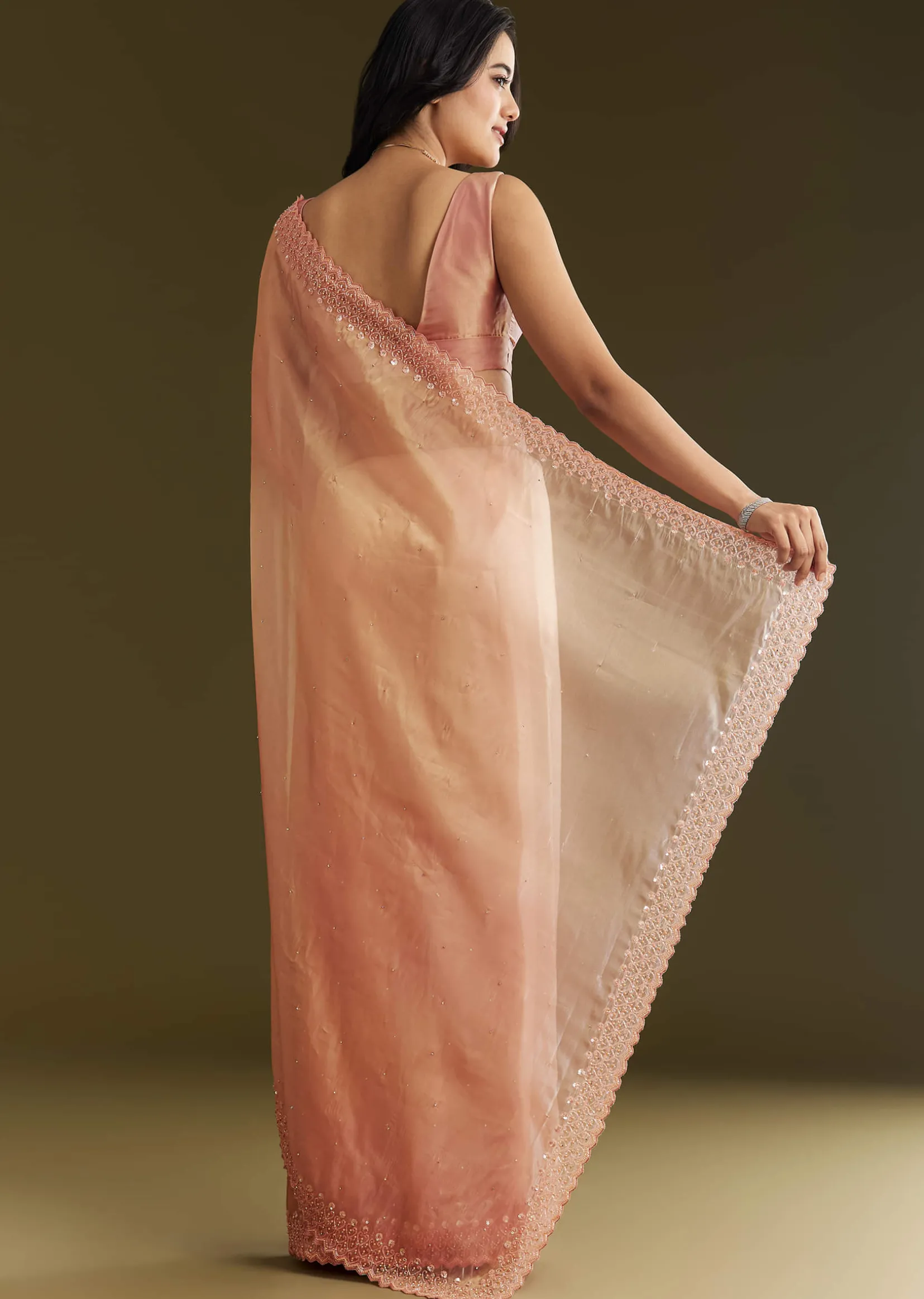 Peach Organza Saree With Stone Embellishment And Scallop Border