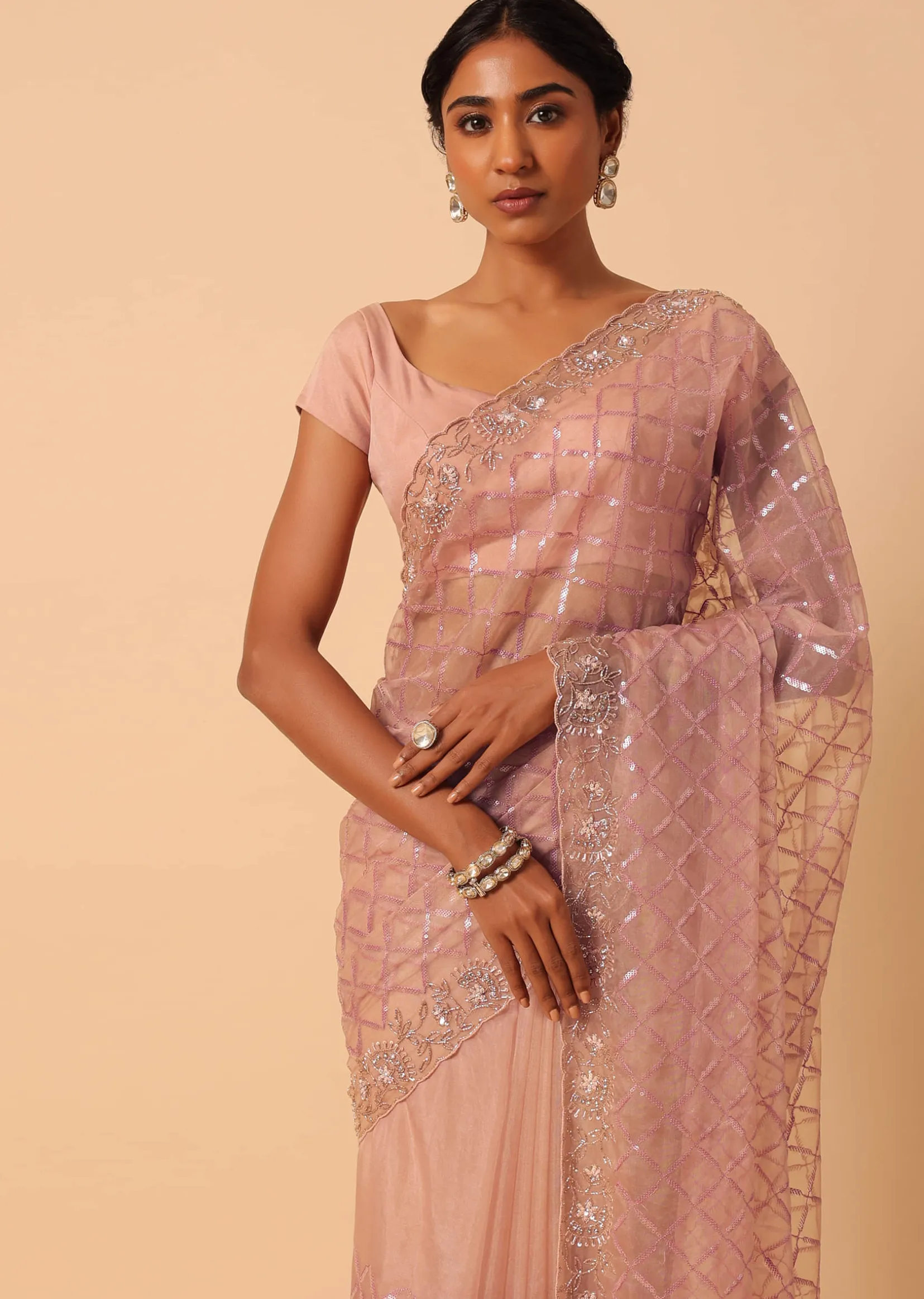 Peach Organza Saree With Cutdana Work And Unstitched Blouse Piece