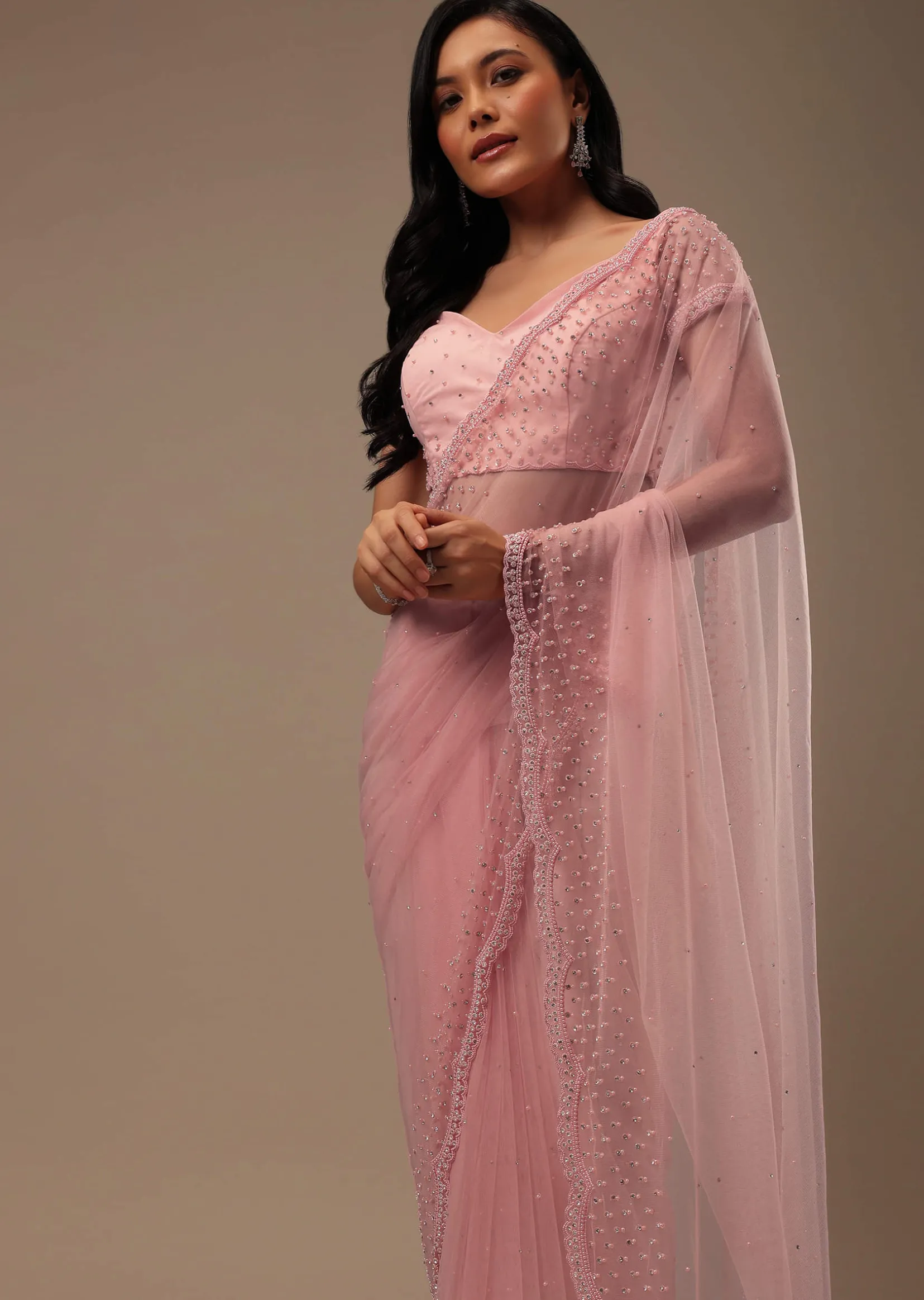 Peach Pink Stone And Beads Embellished Net Saree