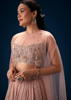 Peach Ruched Lehenga With Embroidered Blouse and Net Cape