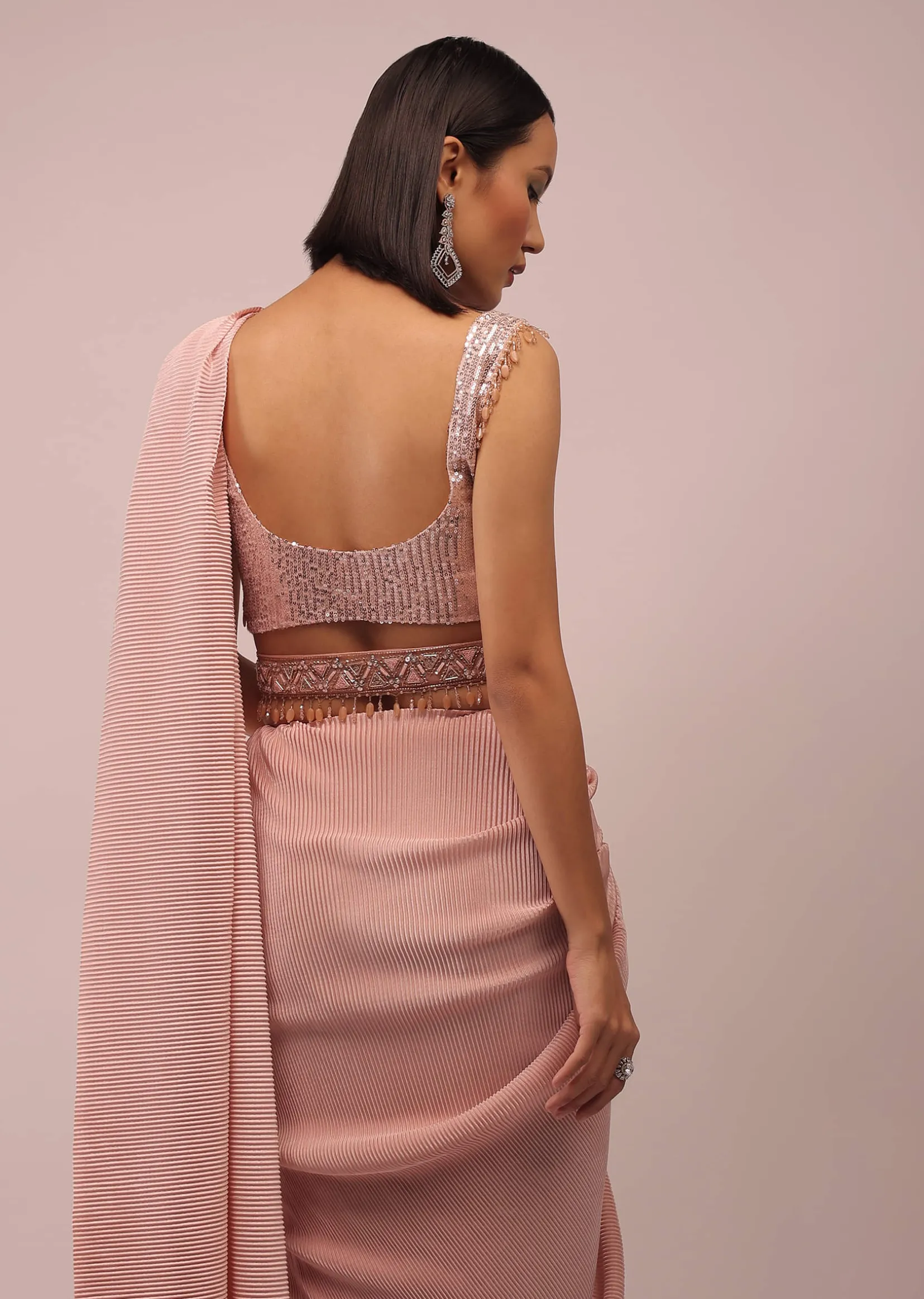 Peach Saree With A Crop Top Crafted In Net With Sequins Embroidery