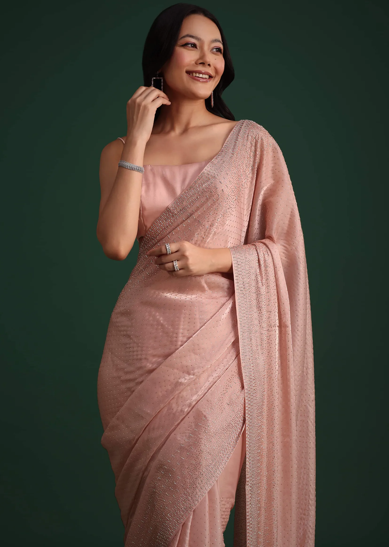Peach Satin Heavy Embroidered Saree With Stones And Diamonds All Over