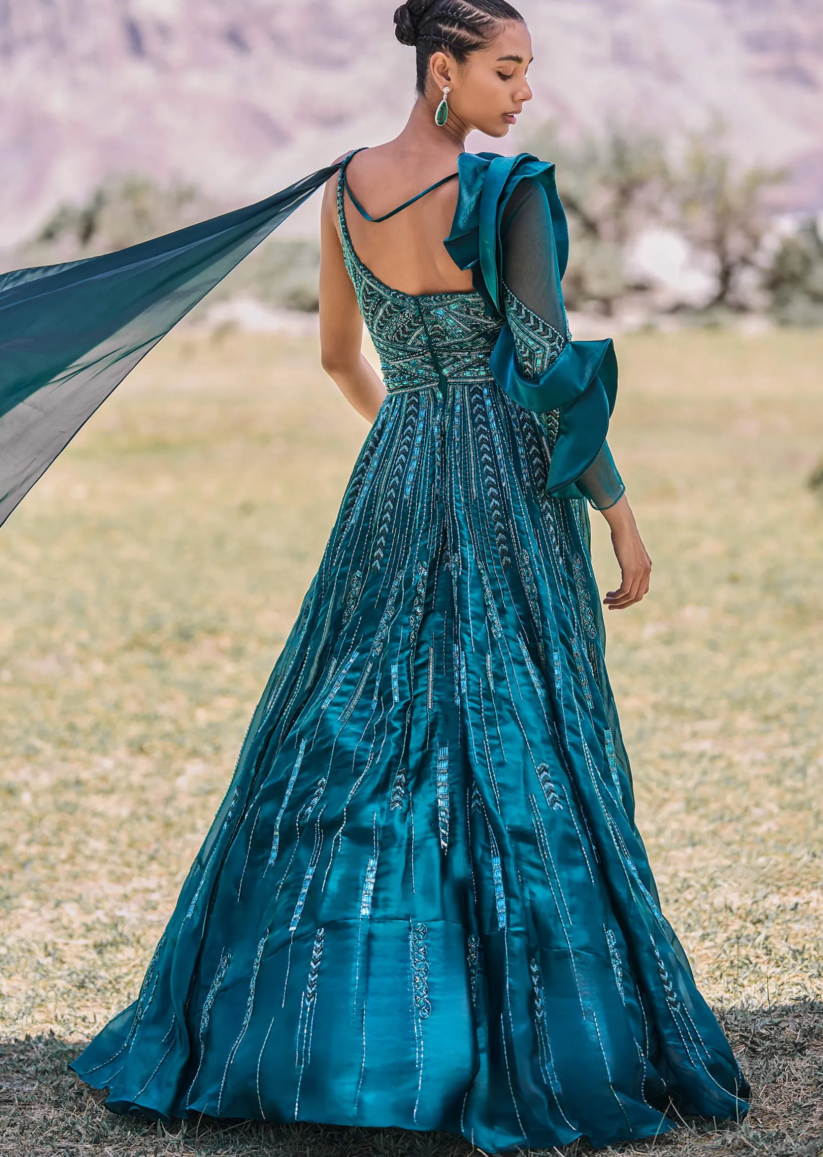 Peacock Green Embroidered Circular Frill Gown With Long Trail