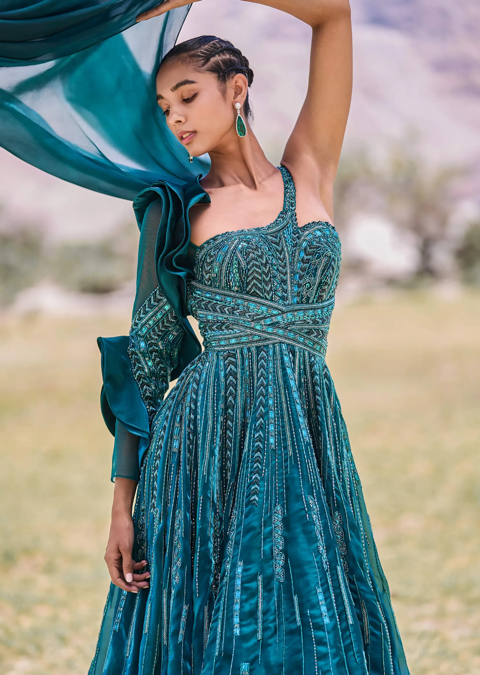 Peacock Green Embroidered Circular Frill Gown With Long Trail