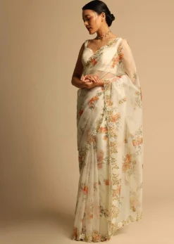 Pearl White Saree In Organza With Floral Print All Over And Moti Embroidered Border Along With Unstitched Blouse