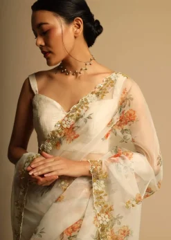 Pearl White Saree In Organza With Floral Print All Over And Moti Embroidered Border Along With Unstitched Blouse