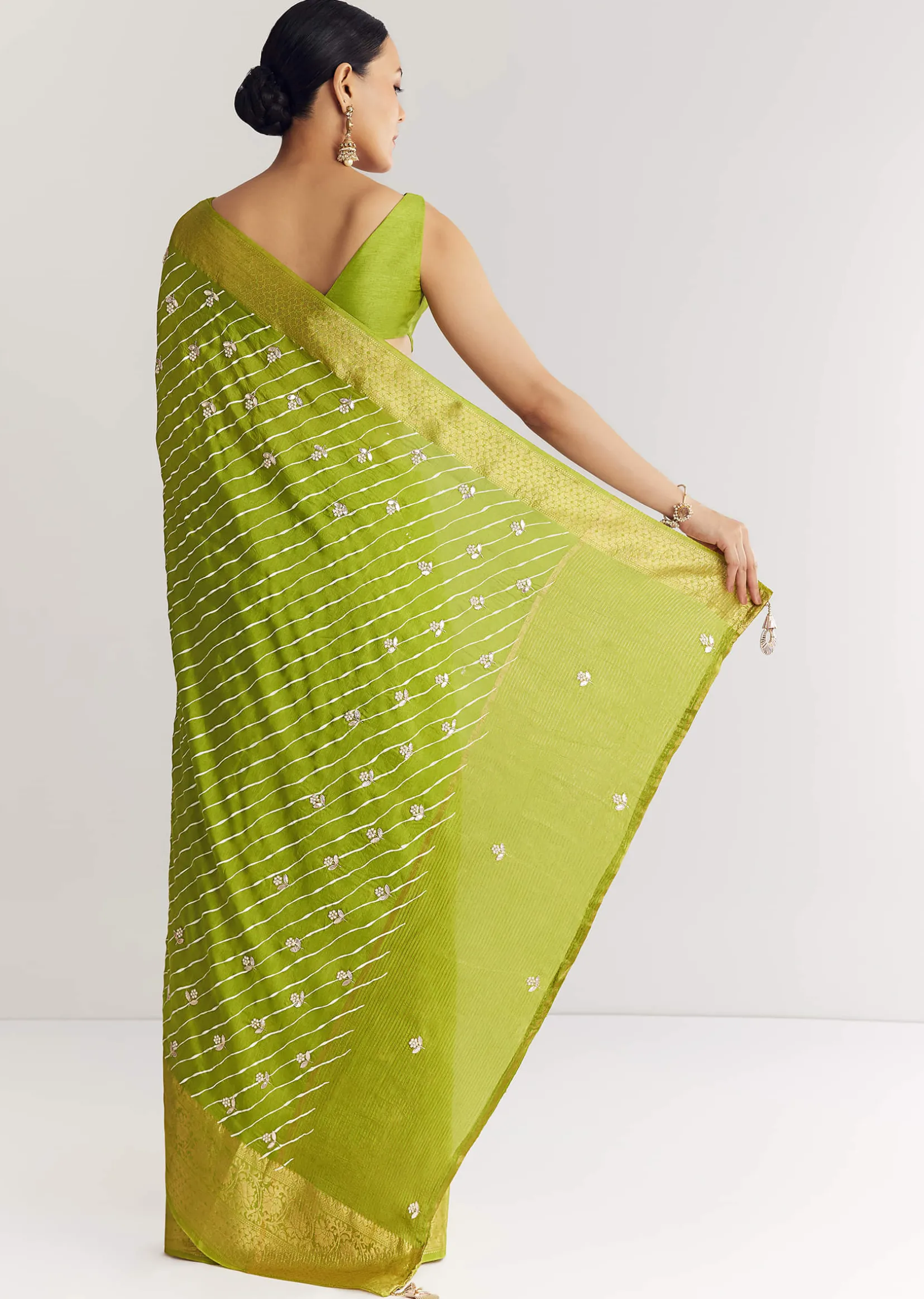 Pista Green Saree With Lehariya Print And Floral Gotapatti And Moti Work.