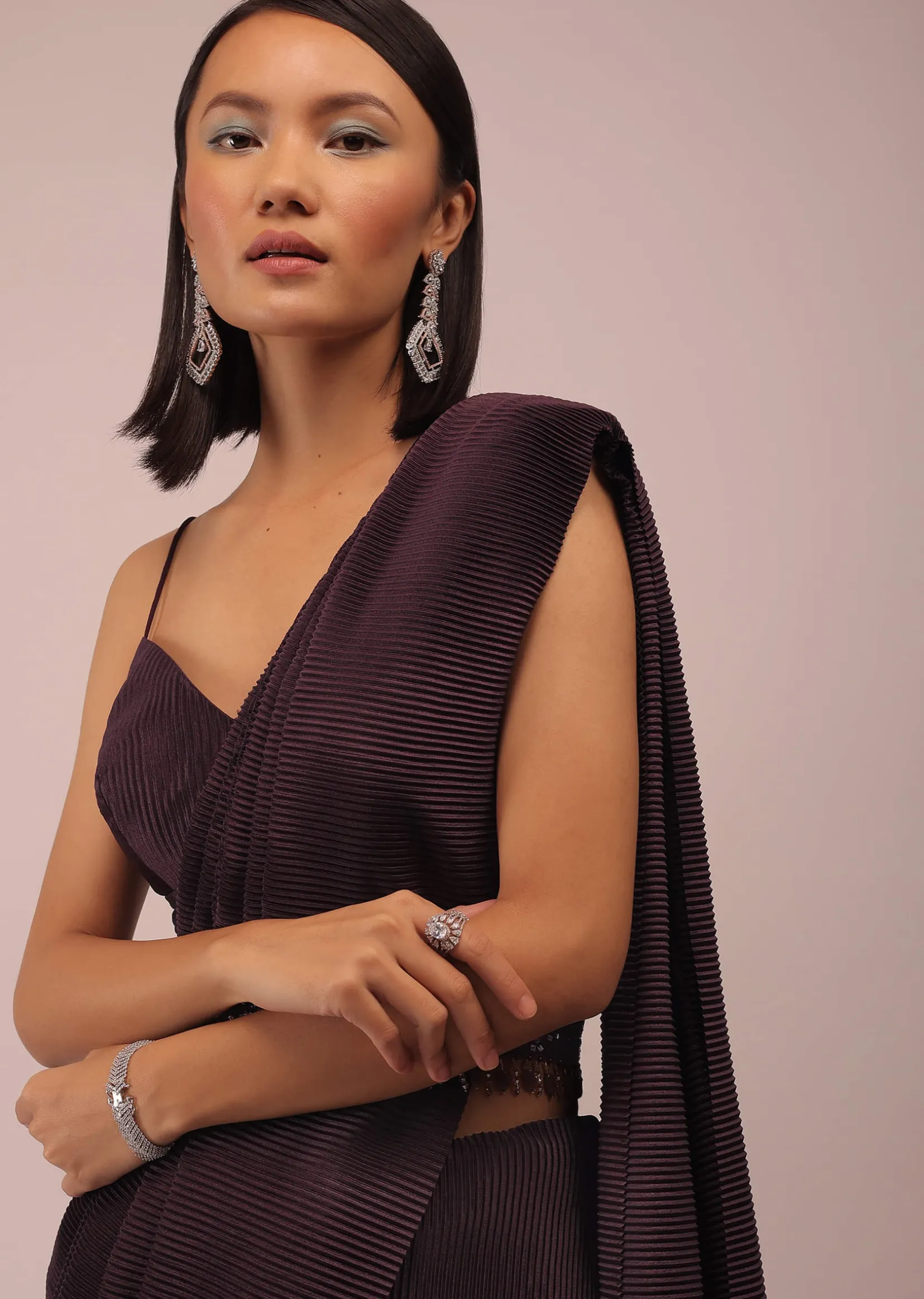 Plum Saree With Moti And Cut Dana Fringes Detailing On The Pallu And A Spaghetti Straps Crop Top With An Embroidered Belt In Fringes