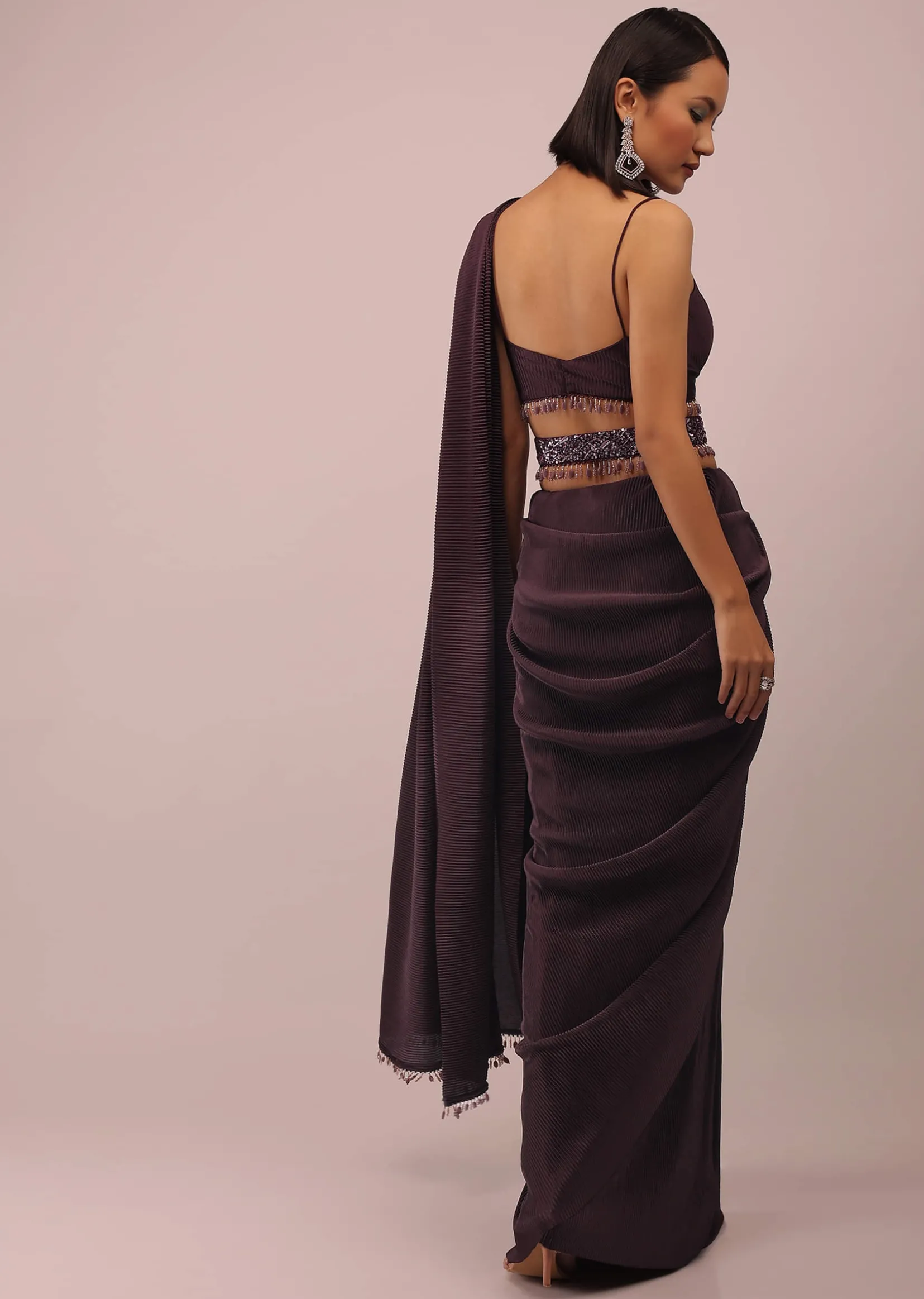 Plum Saree With Moti And Cut Dana Fringes Detailing On The Pallu And A Spaghetti Straps Crop Top With An Embroidered Belt In Fringes