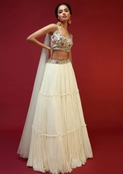 Powder White Lehenga Choli With Attached Cape And Hand Embroidery Using Colorful Resham And Sequins In Floral Motifs