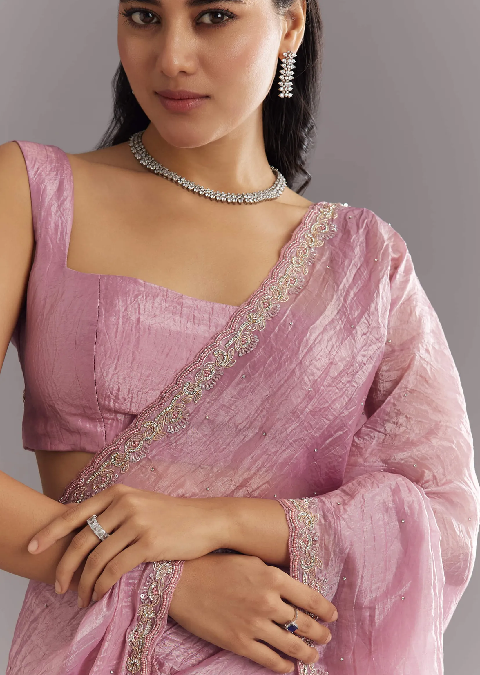 Purple Crushed Tissue Saree With Stone Embellishment And Embroidered Border