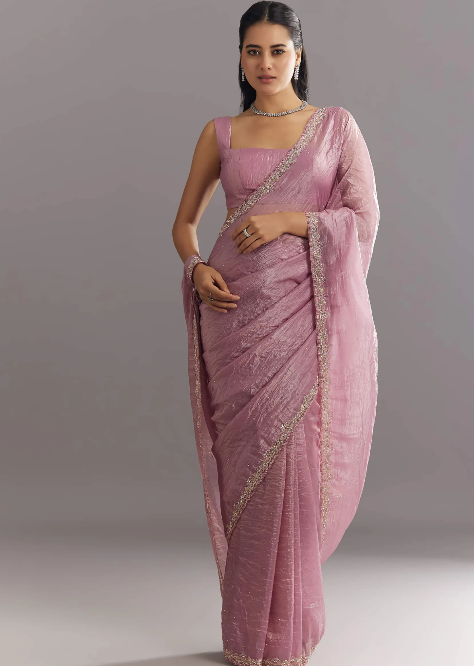 Purple Crushed Tissue Saree With Stone Embellishment And Embroidered Border