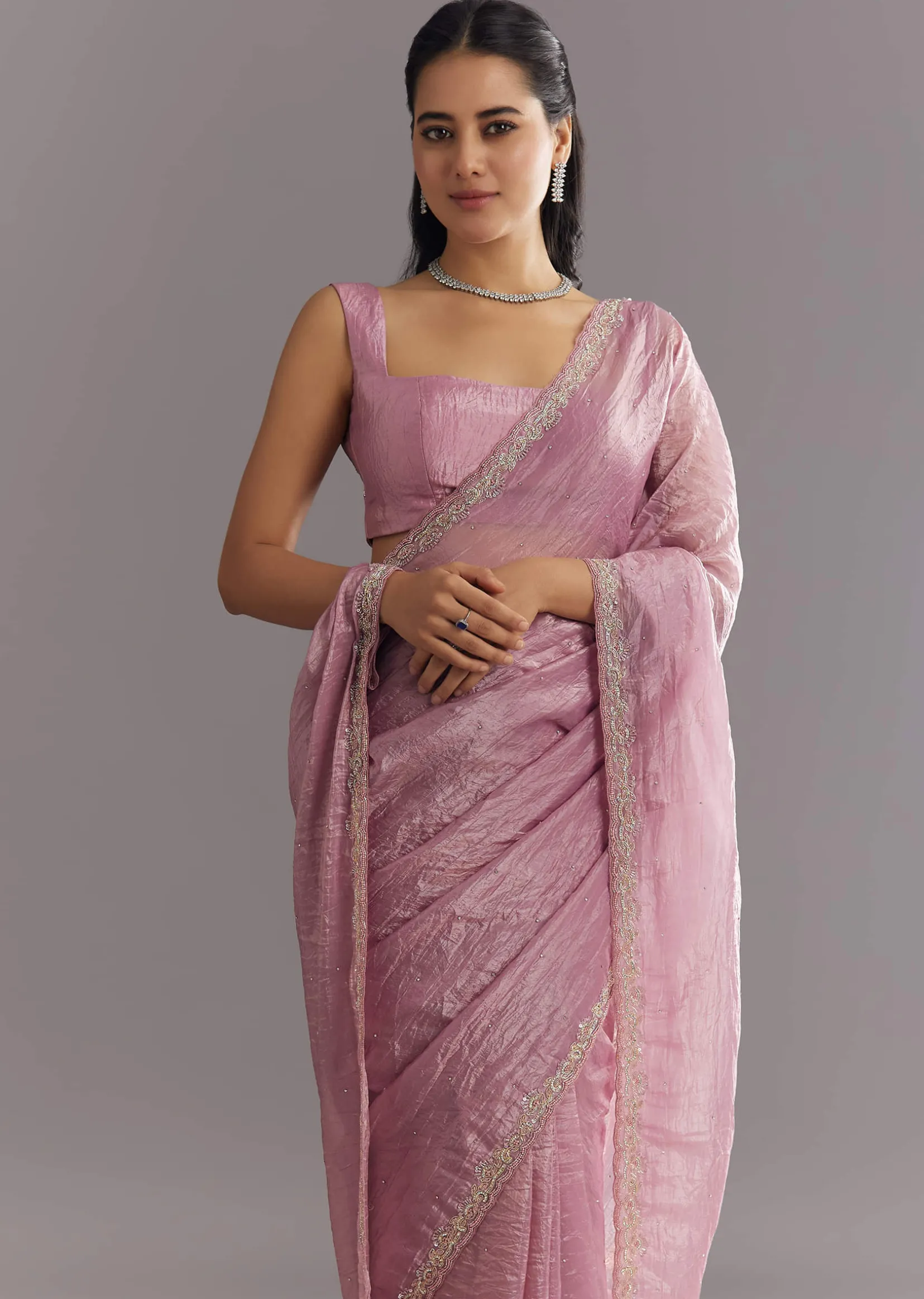 Purple Crushed Tissue Saree With Stone Embellishment And Embroidered Border
