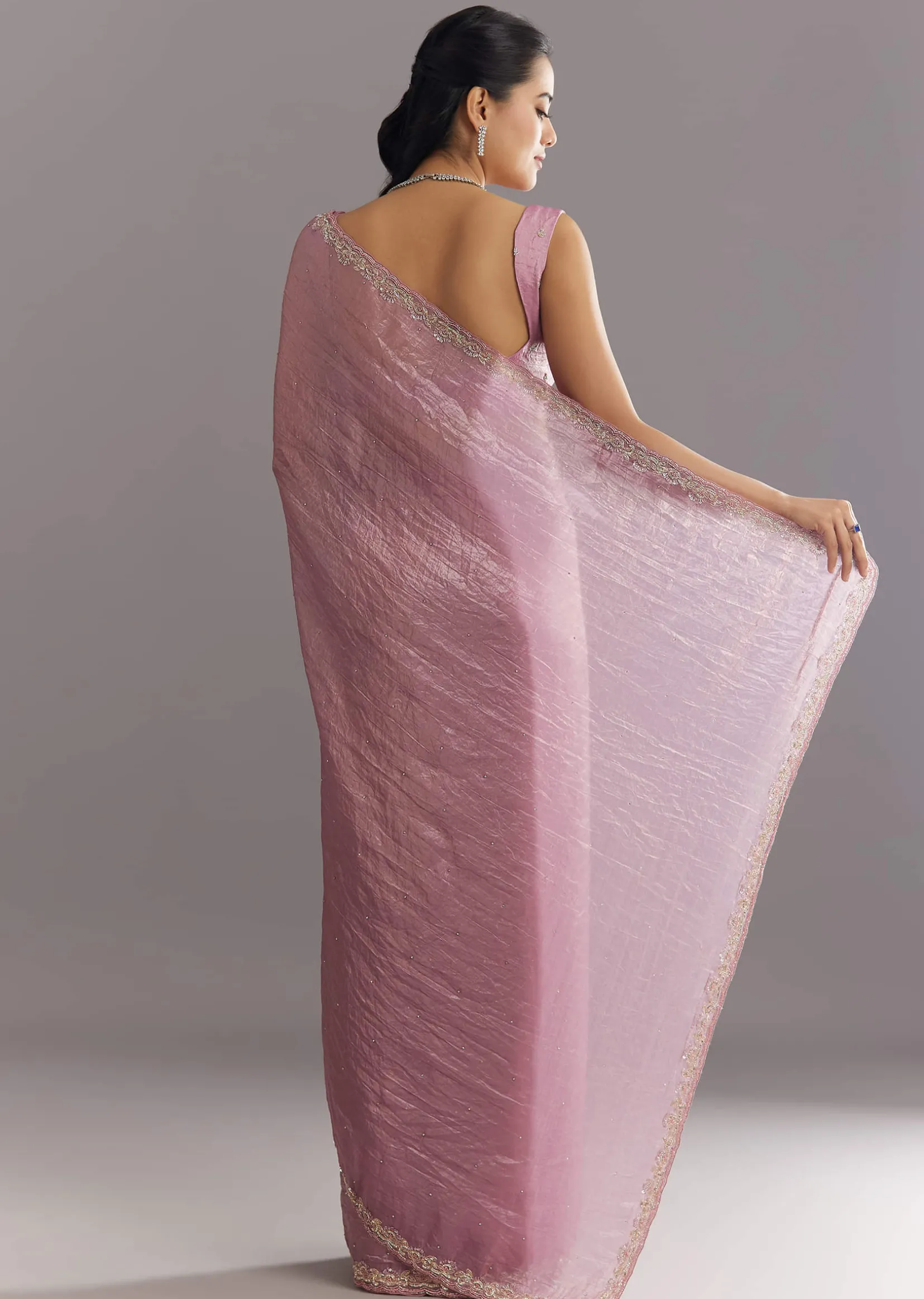 Purple Crushed Tissue Saree With Stone Embellishment And Embroidered Border