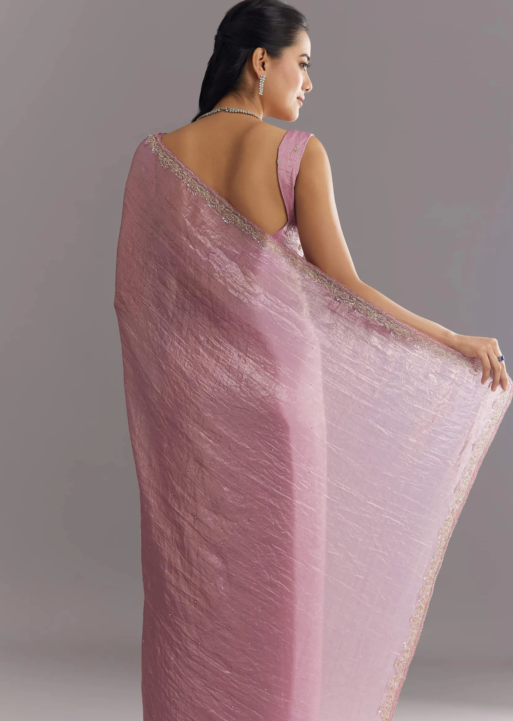 Purple Crushed Tissue Saree With Stone Embellishment And Embroidered Border
