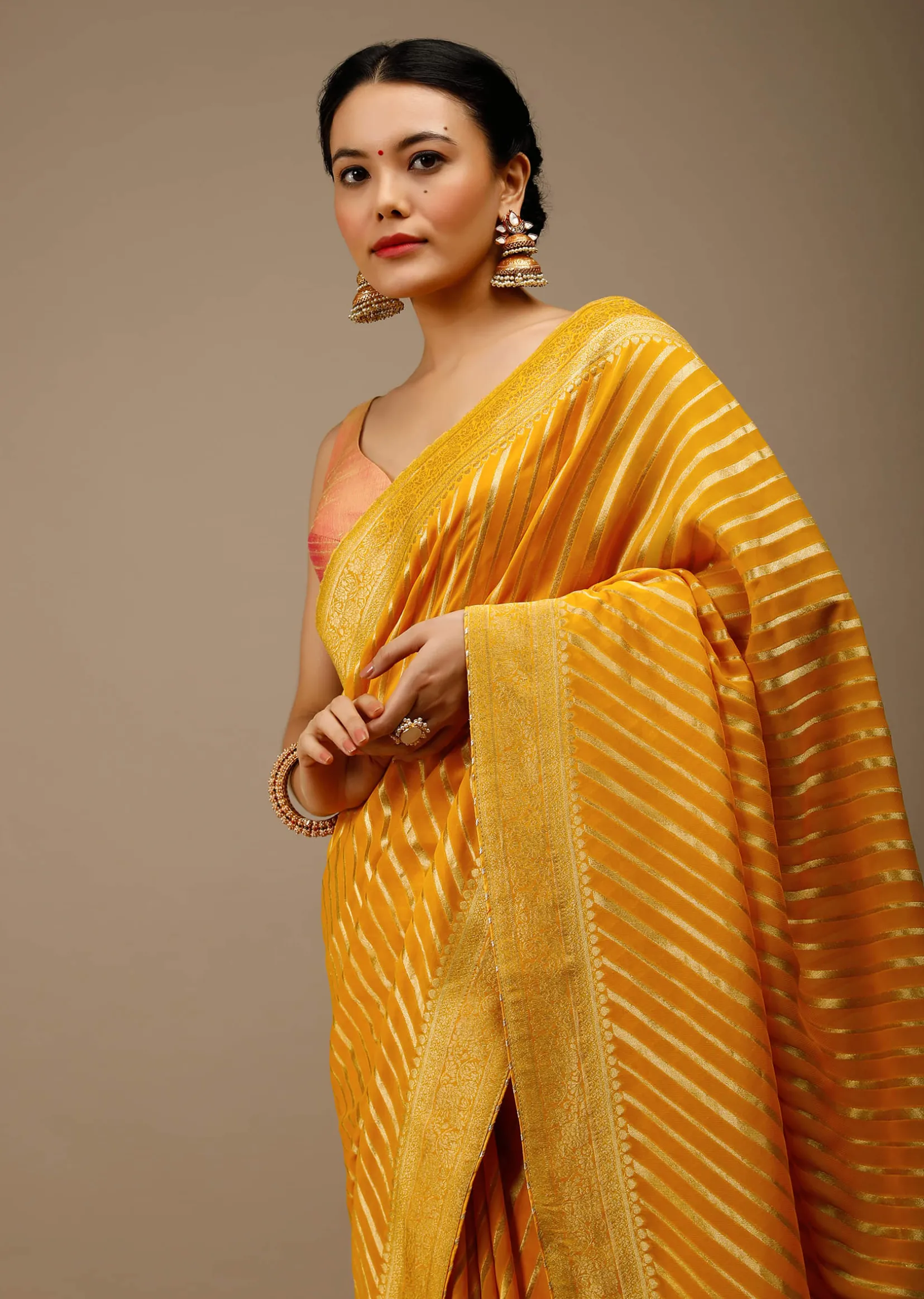 Radiant Yellow Saree In Georgette With Brocade Woven Diagonal Stripes And Floral Border