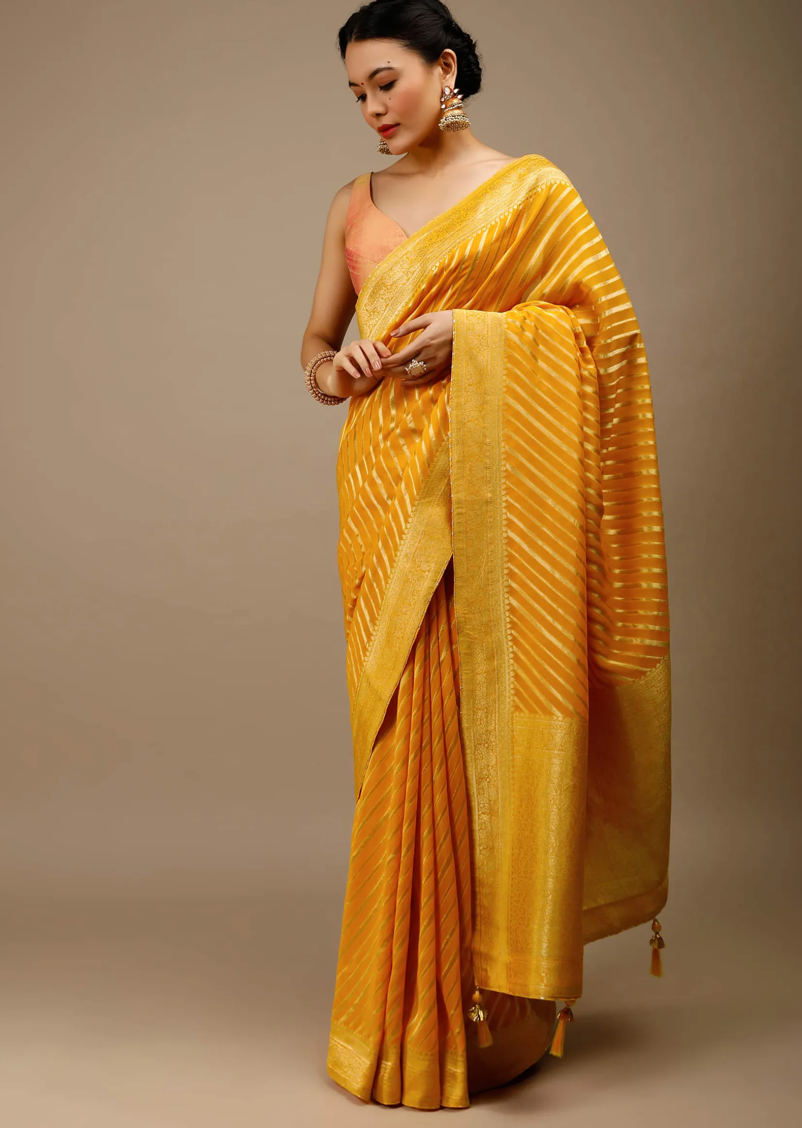 Radiant Yellow Saree In Georgette With Brocade Woven Diagonal Stripes And Floral Border
