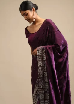 Raisin Purple Saree In Satin With Two Toned Kundan Embellished Border And Ready Stitched Blouse