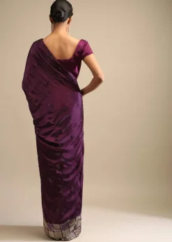 Raisin Purple Saree In Satin With Two Toned Kundan Embellished Border And Ready Stitched Blouse