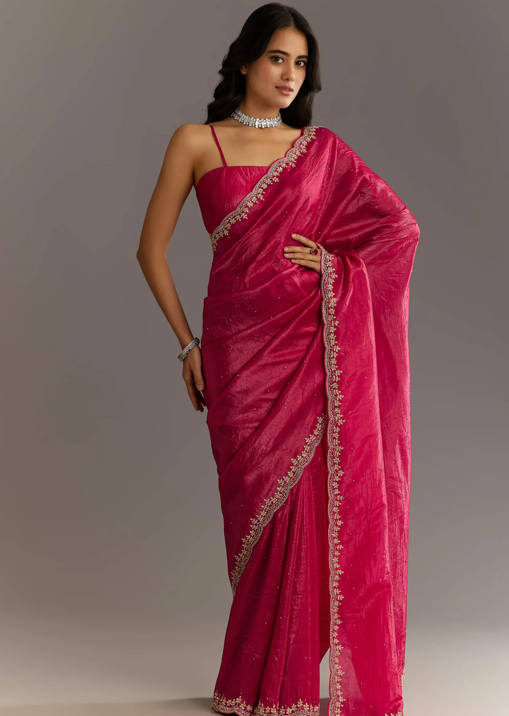 Rani Pink Crushed Tissue Saree With Stone Embellishments And Scallop Border
