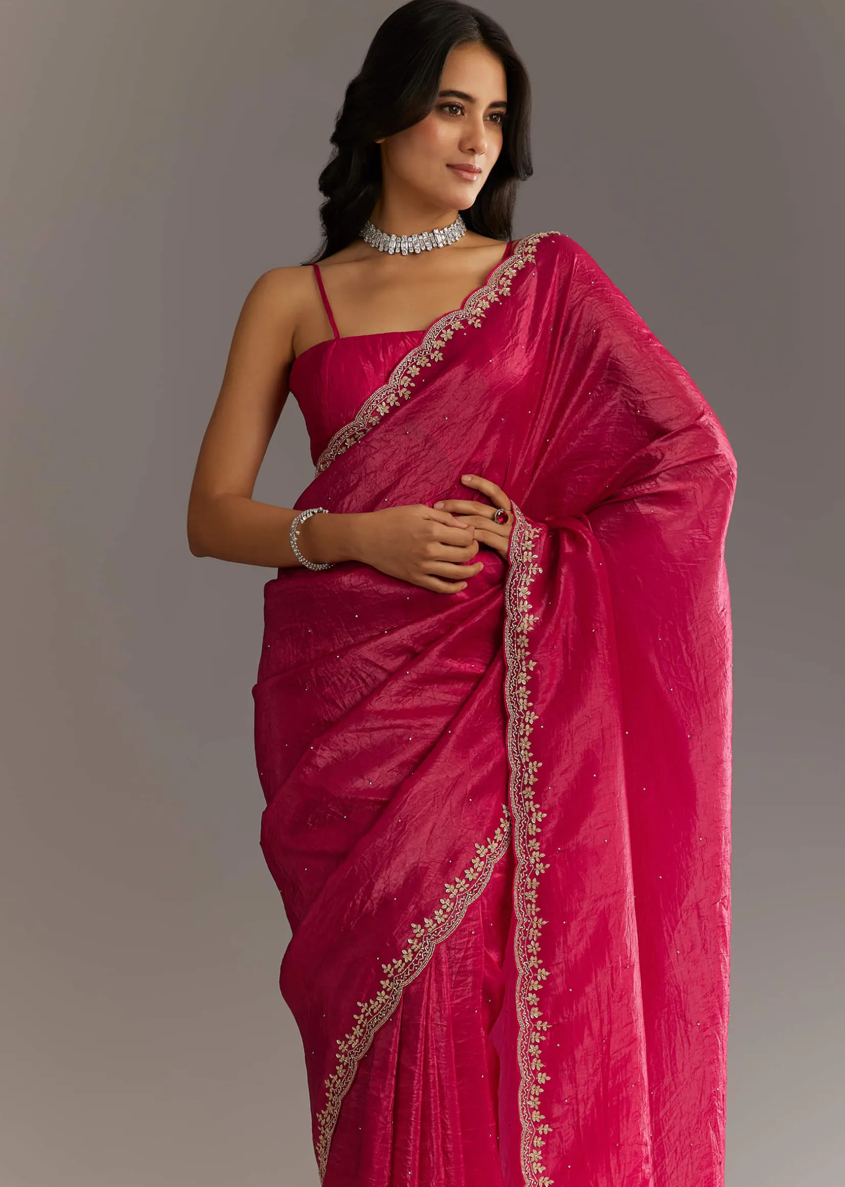 Rani Pink Crushed Tissue Saree With Stone Embellishments And Scallop Border
