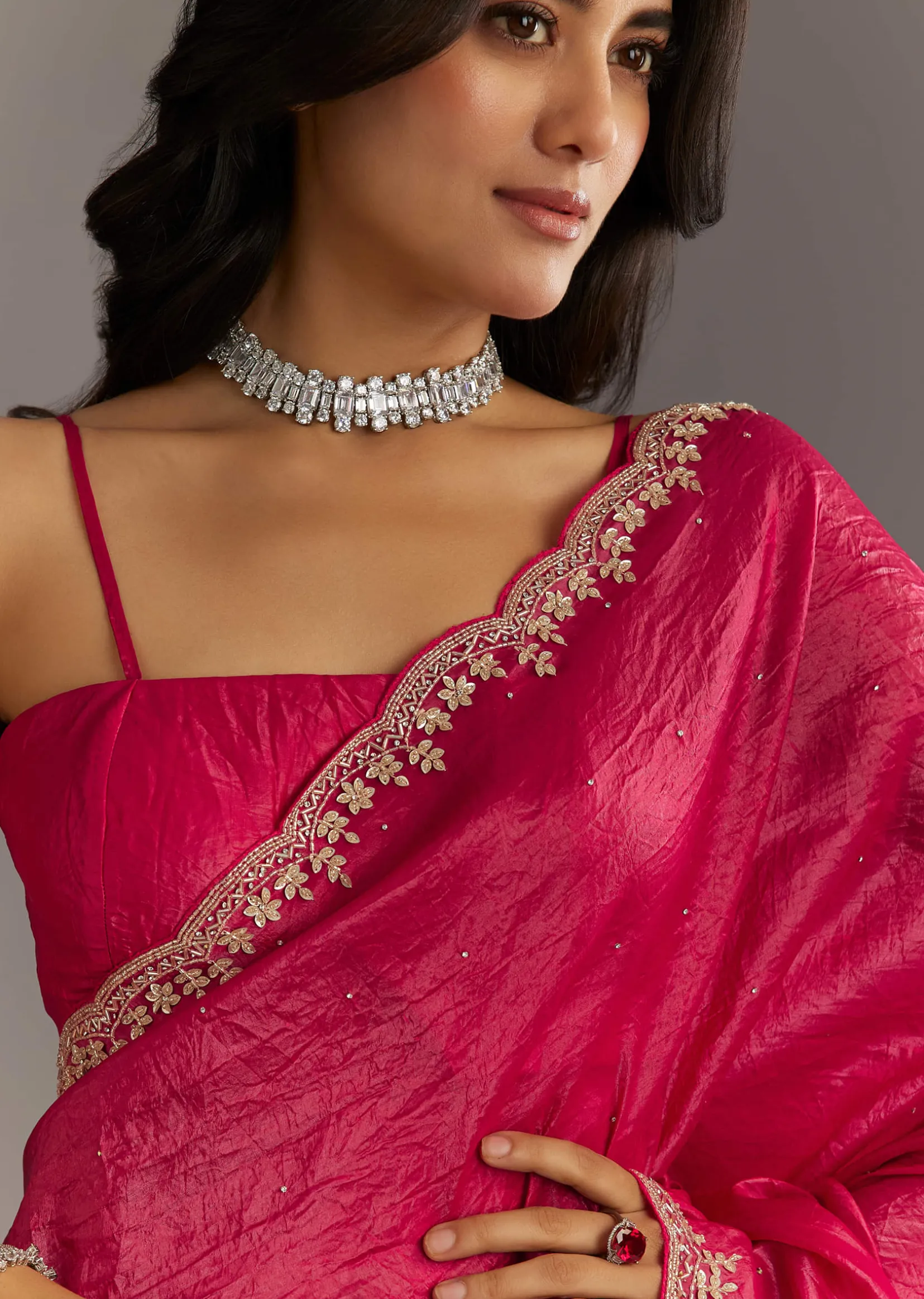 Rani Pink Crushed Tissue Saree With Stone Embellishments And Scallop Border