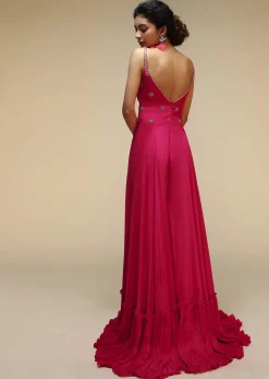 Rani Pink Jumpsuit With An Overlapping Neckline Adorned In Hand Embroidered Buttis Using Cut Dana And Sequins