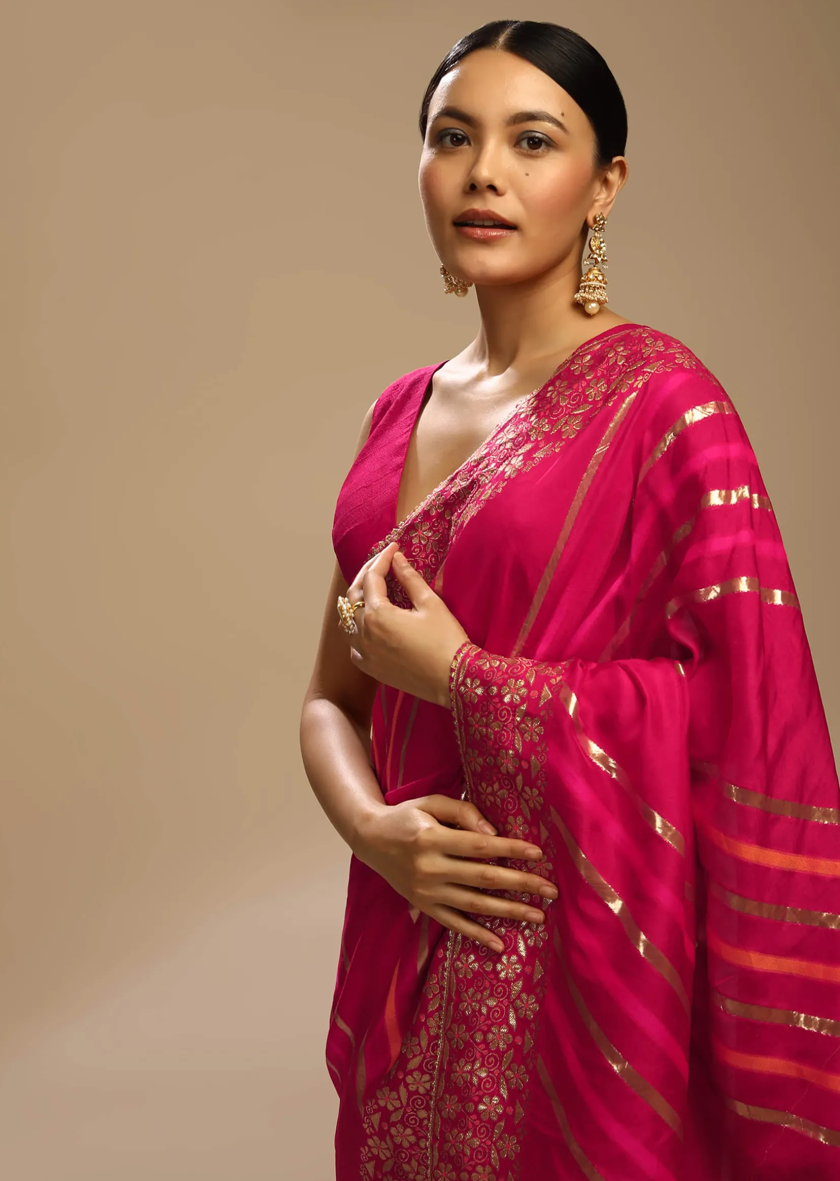 Rani Pink Saree In Dola Silk With Multi Colored Woven Diagonal Stripes And Floral Border