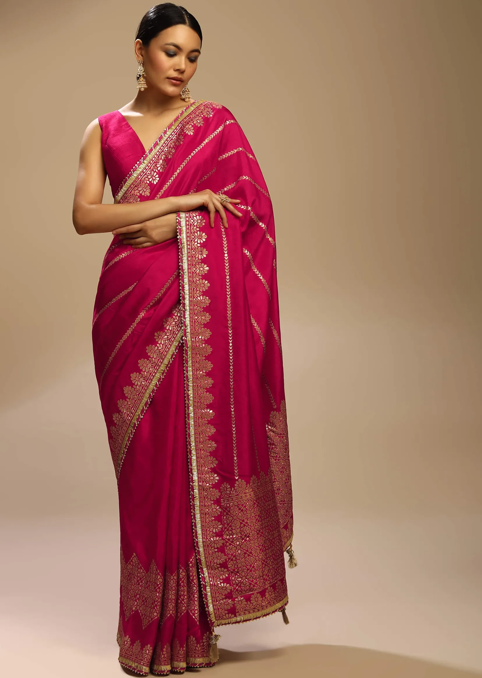 Rani Pink Saree In Silk With Woven Stripes Floral Motifs On The Border