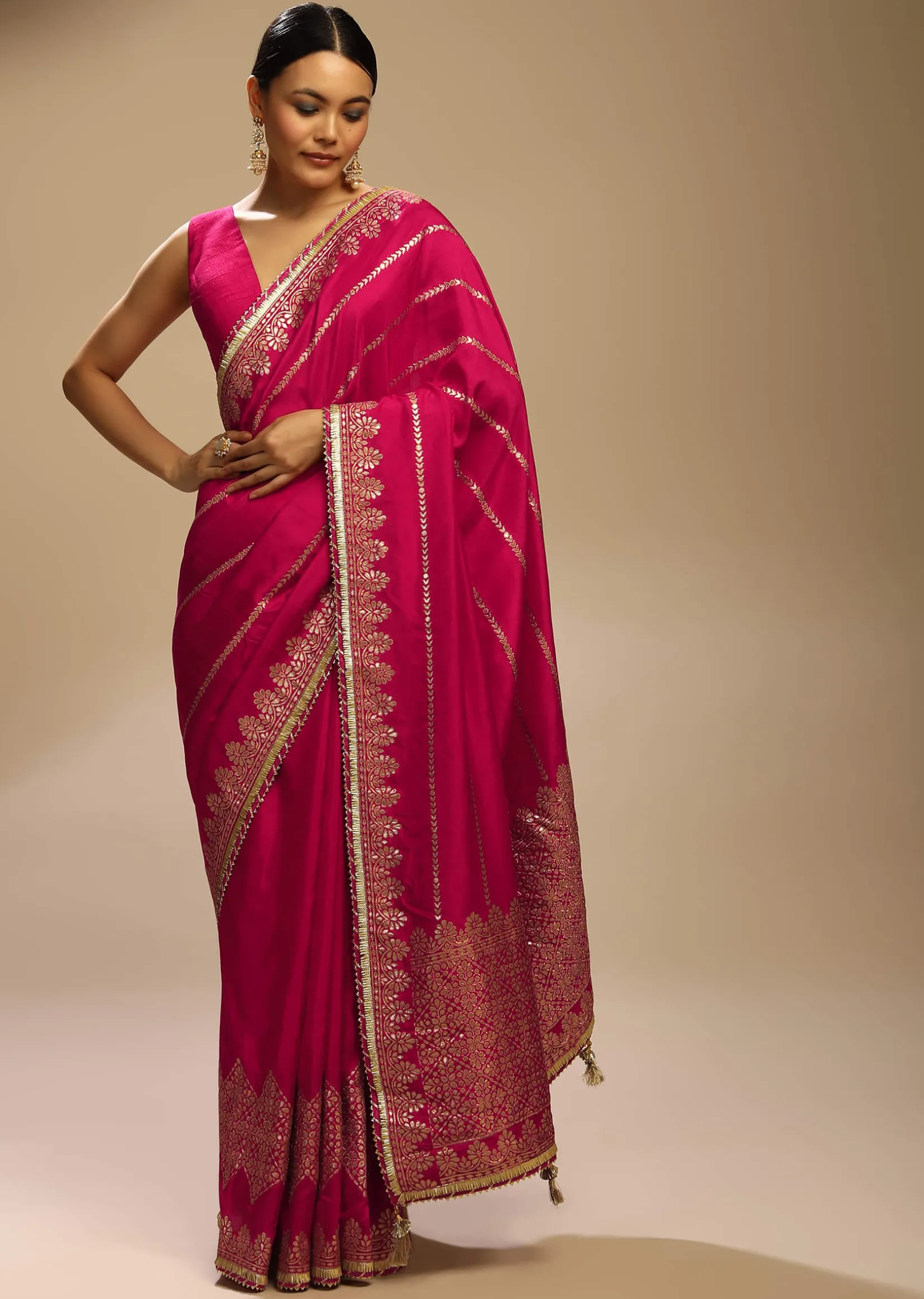 Rani Pink Saree In Silk With Woven Stripes Floral Motifs On The Border