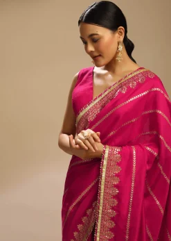 Rani Pink Saree In Silk With Woven Stripes Floral Motifs On The Border