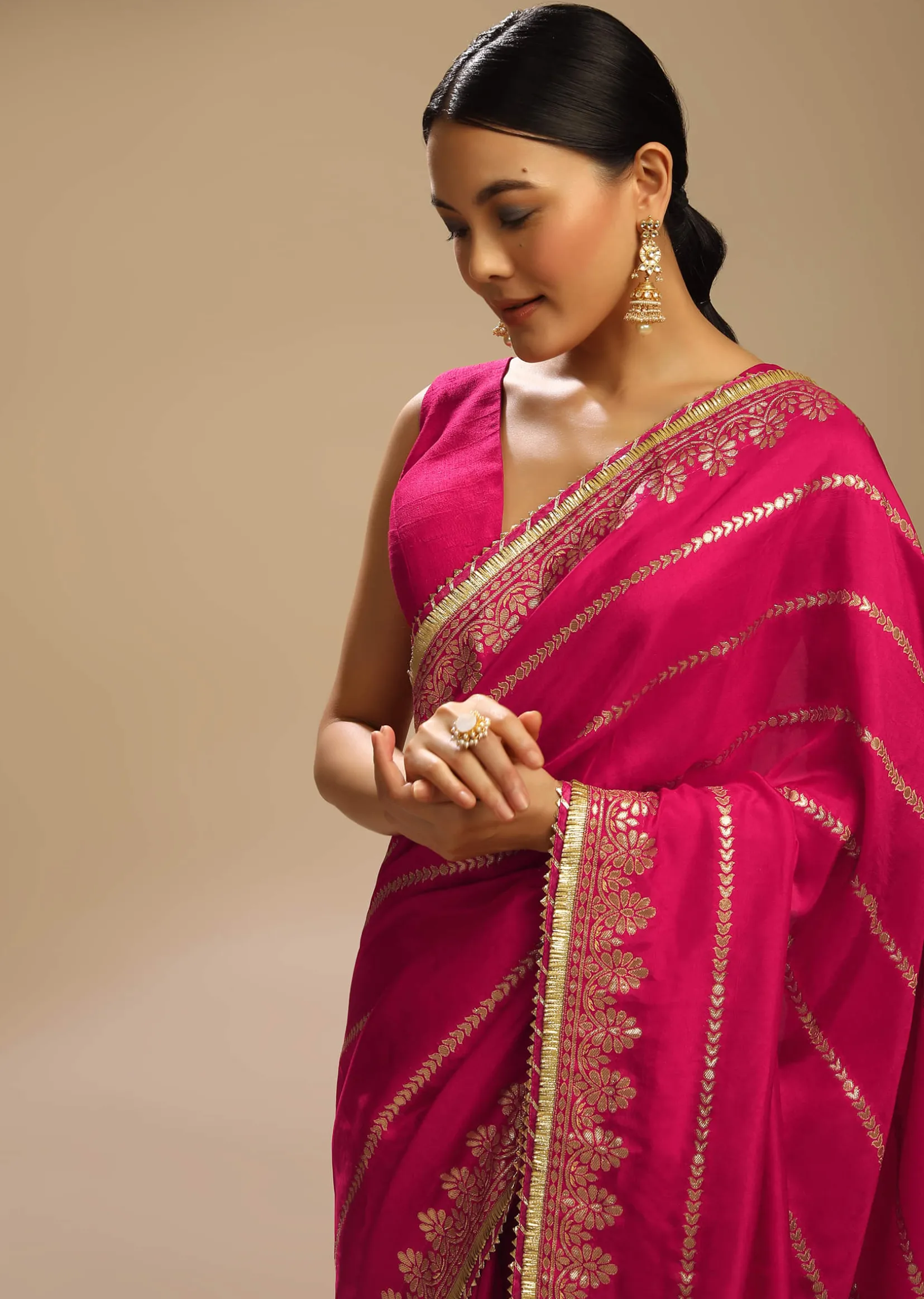 Rani Pink Saree In Silk With Woven Stripes Floral Motifs On The Border