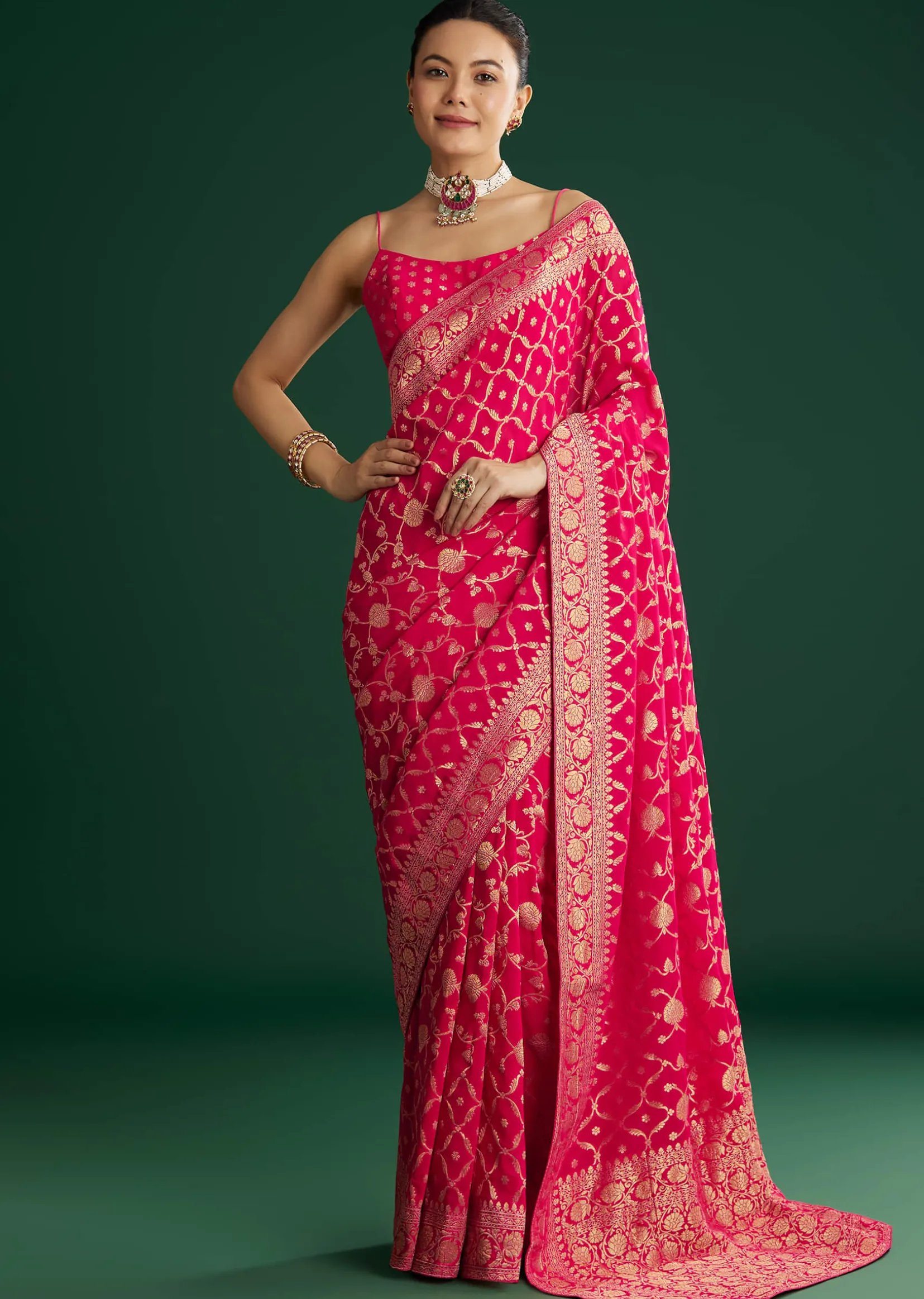 Rani Pink Woven Saree With Jaal Work And Floral Border