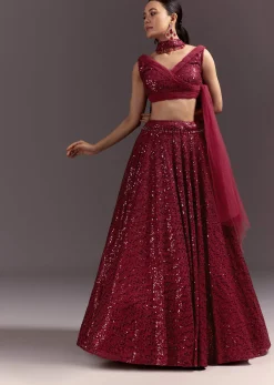 Red Lehenga Set With Embellished Dupatta And Tassels