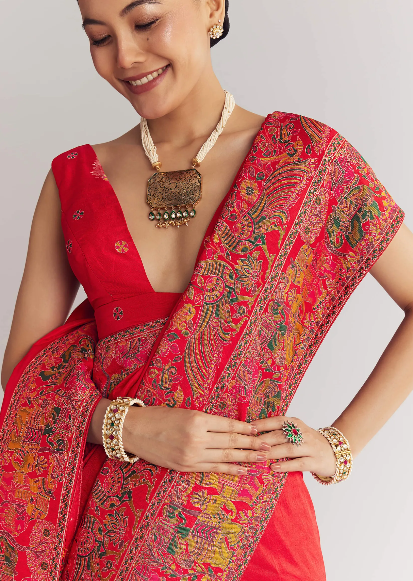 Red Saree With Traditional Floral And Animal Prints