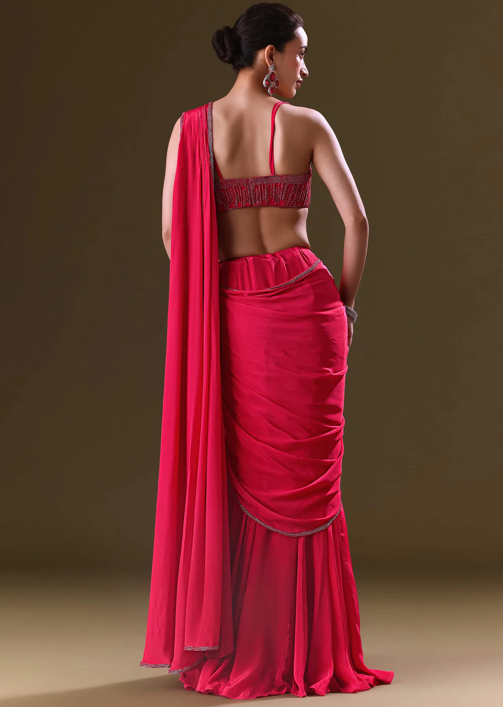 Reddish Pink Pre Stitched Draped Saree With Corset Fit Embroidered Blouse